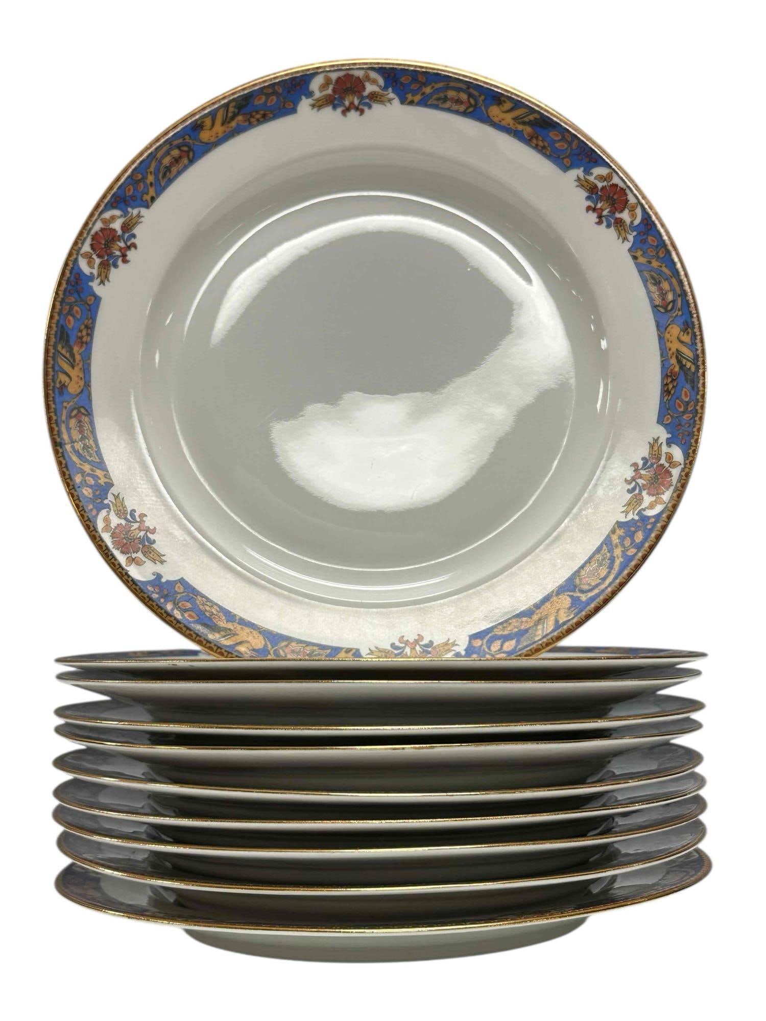 Limoges France "Old Abbey" Dinner Plates Circa 1910's (10): Set of ten Limoges "Old Abbey" pattern dinner plates by Latrille Freres. Having blue and gold borders with griffin type bird decor. Measuring approx. 9.5" diameter. In good condition, see photos.