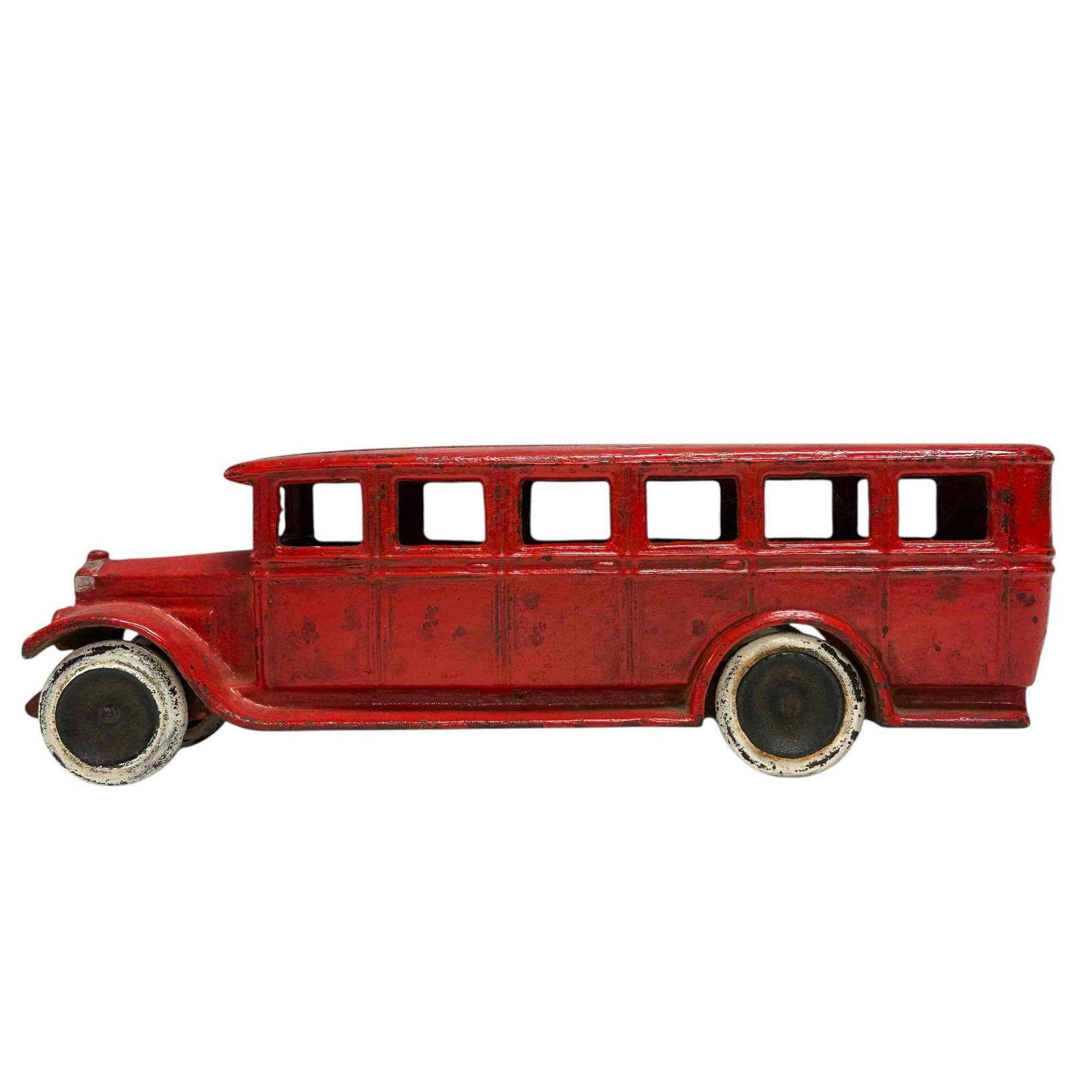 1920's Skoglund and Olson Seto Sweden Cast Iron Bus: Swedish Skoglund and Olson Seto cast iron bus. Having original paint and tires. Measuring approx. 10.75" long by 3.5" tall. Having areas of paint losses and fading expected with age and play, see phot