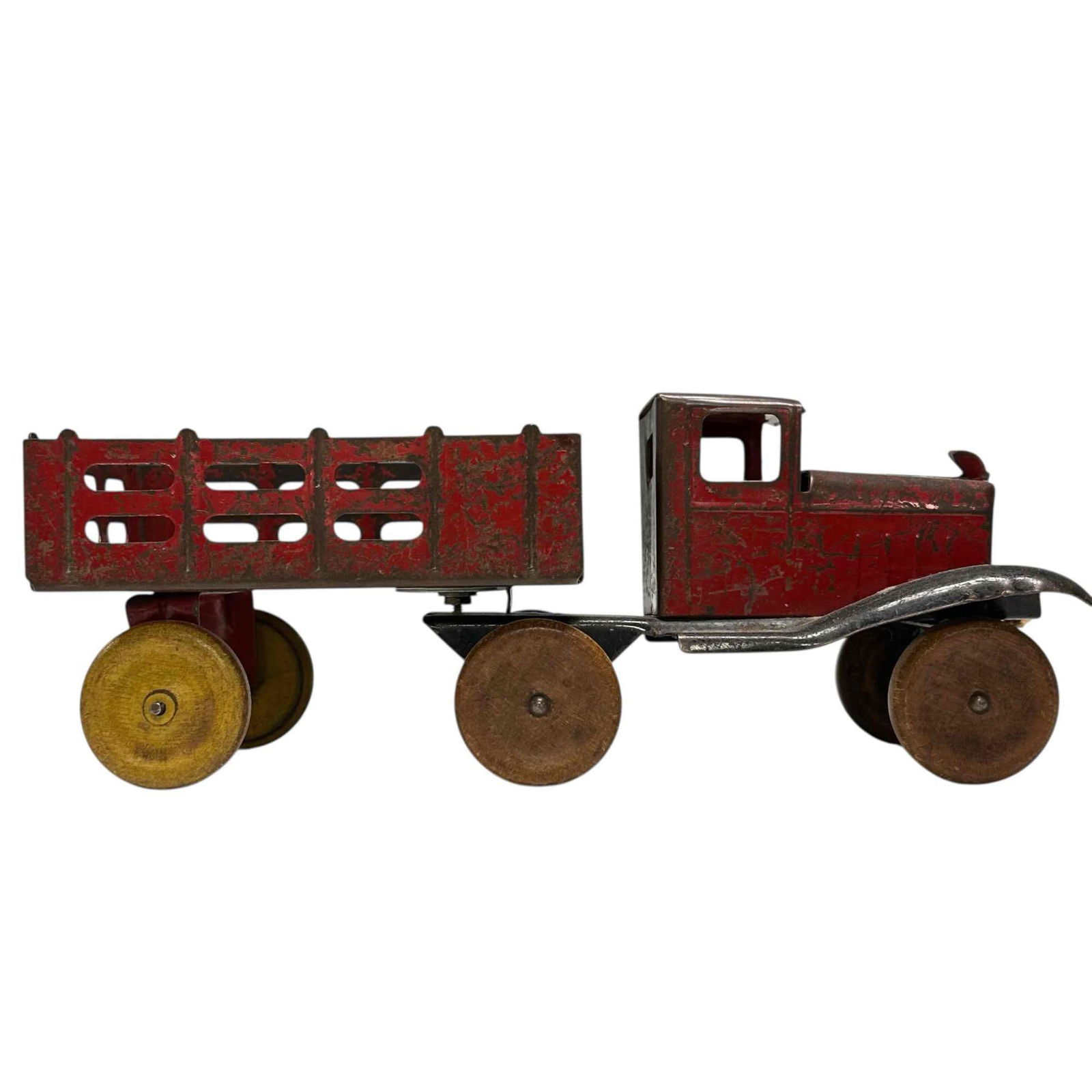 Girard Pressed Steel Goose Neck Stake Body Truck and Trailer: Circa 1930's-40's Girard pressed steel goose neck truck with stake body trailer. Measuring approx. 10.5" long by 4" tall. Having original paint with areas of losses expected with age and wear, see pho