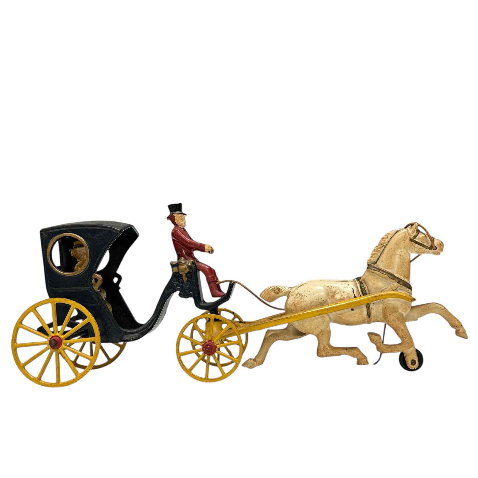 1890's Kenton Cast Iron Horse Drawn Carriage: Late 19th century Kenton cast iron horse drawn carriage with removable driver and female figure. Measuring approx. 15.5" long by 6.25" to top of drivers top hat. Having original paint in good conditio