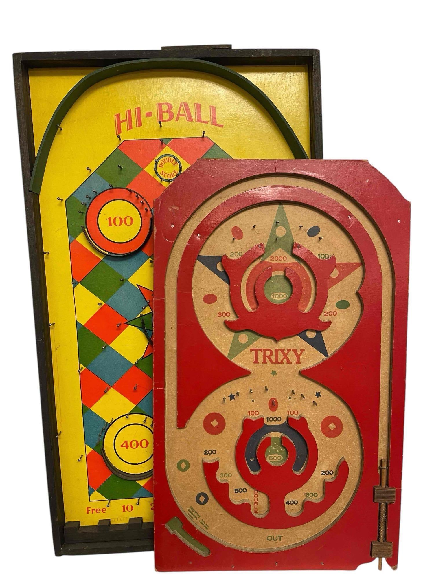 Two Wooden Bagatelle Games - Hi Ball & Trixy: Two wooden bagatelle games. Hi-Ball appears to be in good condition with minimal wear to the playing surface and frame. Plunger functions and all pins and obstacles appear to be attached. The Trixy ga