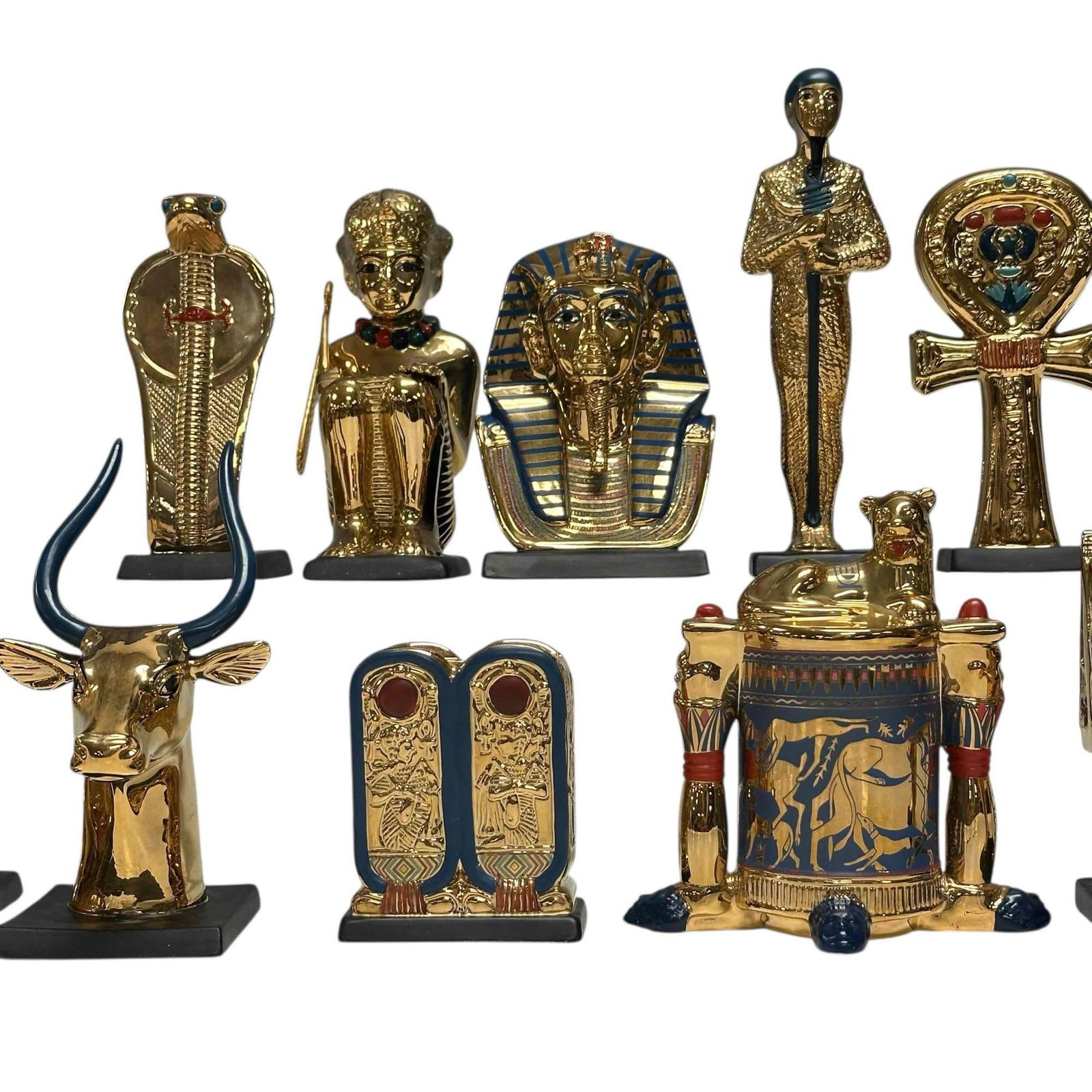 Franklin Mint "Treasures of Tutankhamun" Egyptian Collection (12): 1989 Franklin Mint "Treasures of Tutankhamun" 24 karat gold plated collection of miniature porcelain replicas of artifacts found in King Tut's tomb. Measuring approx. 2.5" to 5" tall. In good conditio
