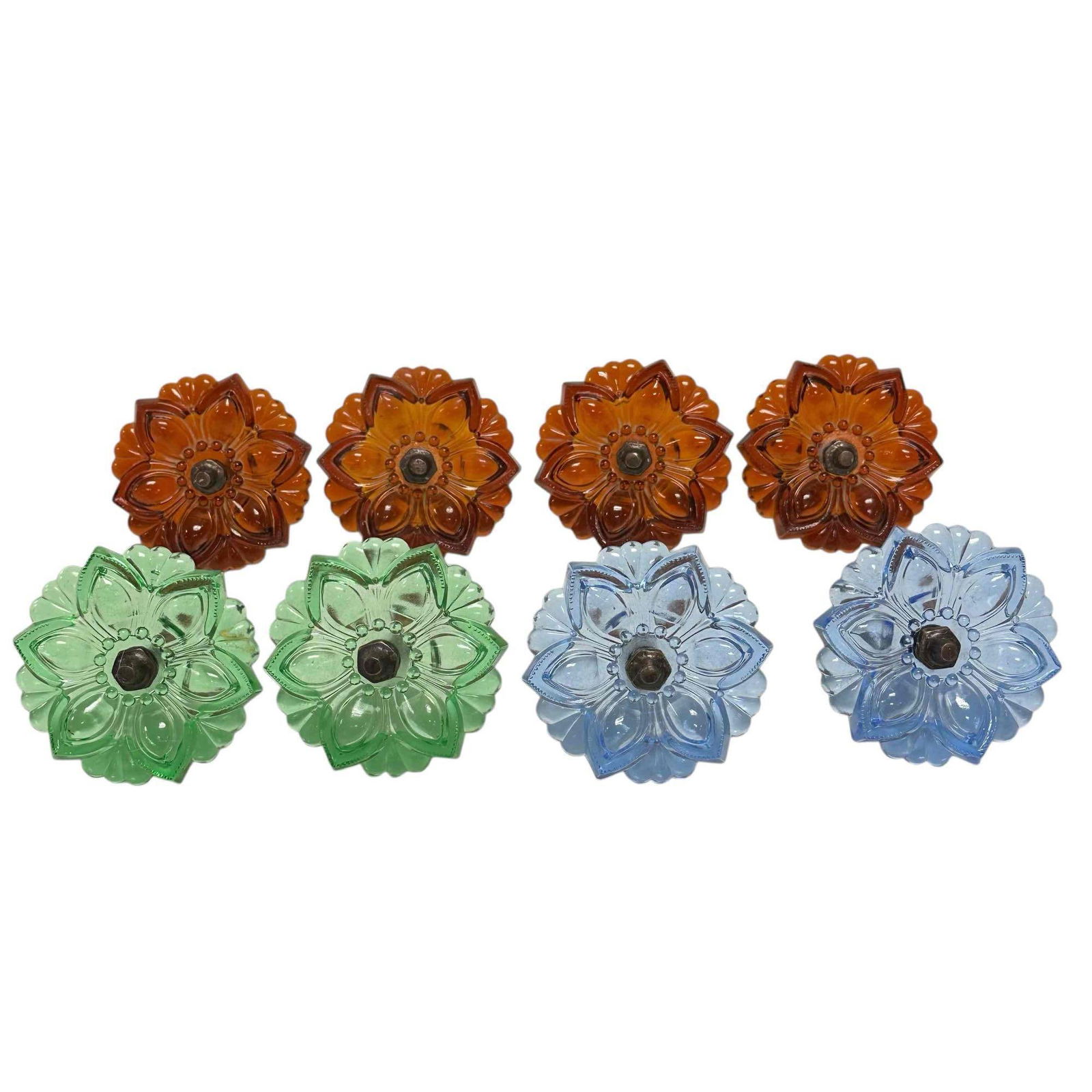 Pressed Glass Curtain Tie-Backs or Curtain Knobs (8): Four pair of multicolor curtain tie-backs in floral starburst motif. Measuring approx. 4.25" diameter with 3" long curtain resting rod area. In good condition, see photos.