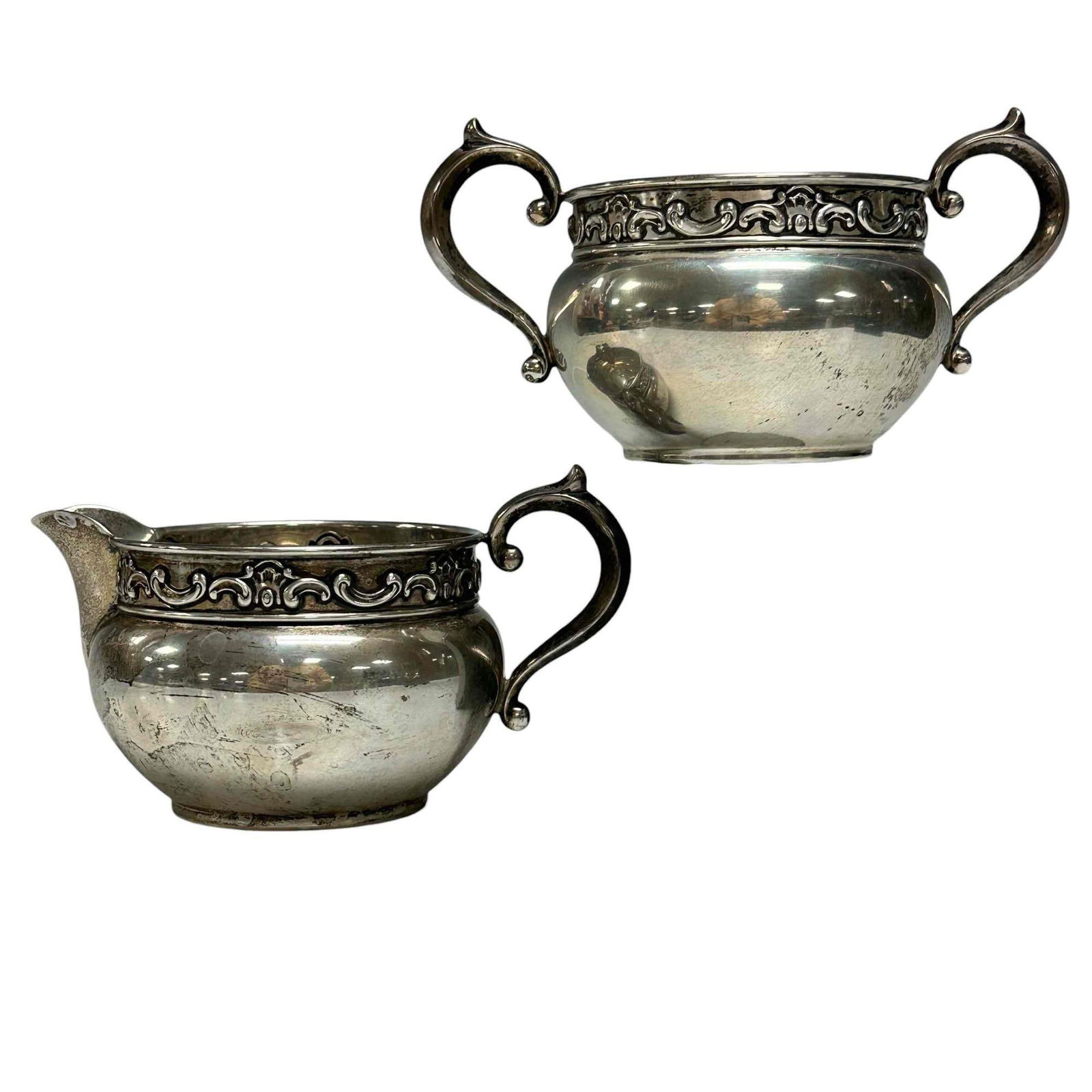 Gorham "Strasbourg" Creamer and Sugar Set 186 Grams (2): Late 19th century Gorham "Strasbourg" sterling silver creamer and sugar bowl set. Total weight is 186 grams and are not weighted. Measuring approx. 3" tall to top of handles by 3" openings, stamped 11