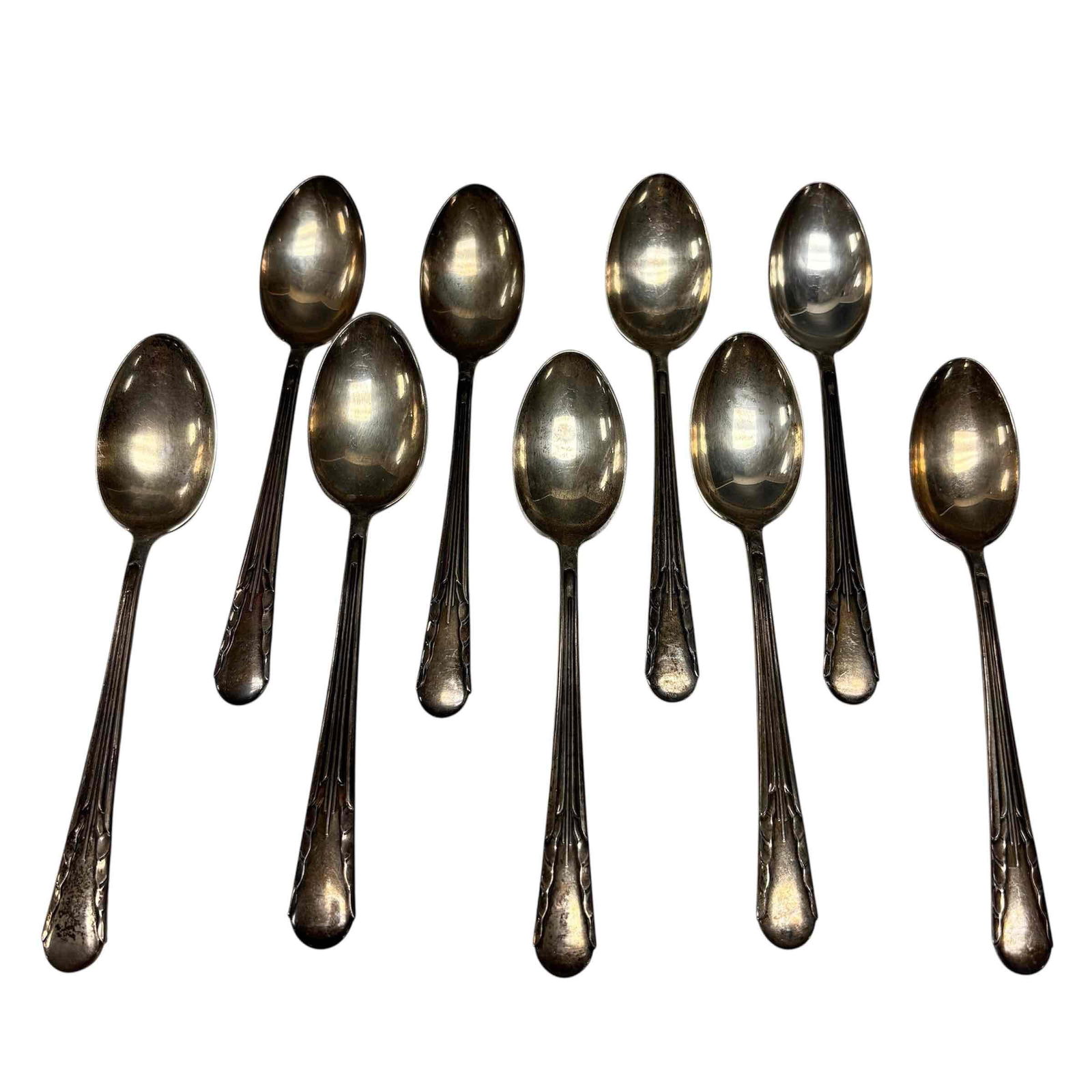Nine International Sterling Silver Table Spoons 186 Grams: International sterling silver table spoons pat. 1923 art deco motif. Measuring approx. 5.75" long, weighting 186 grams total. In good age appropriate condition, see photos.