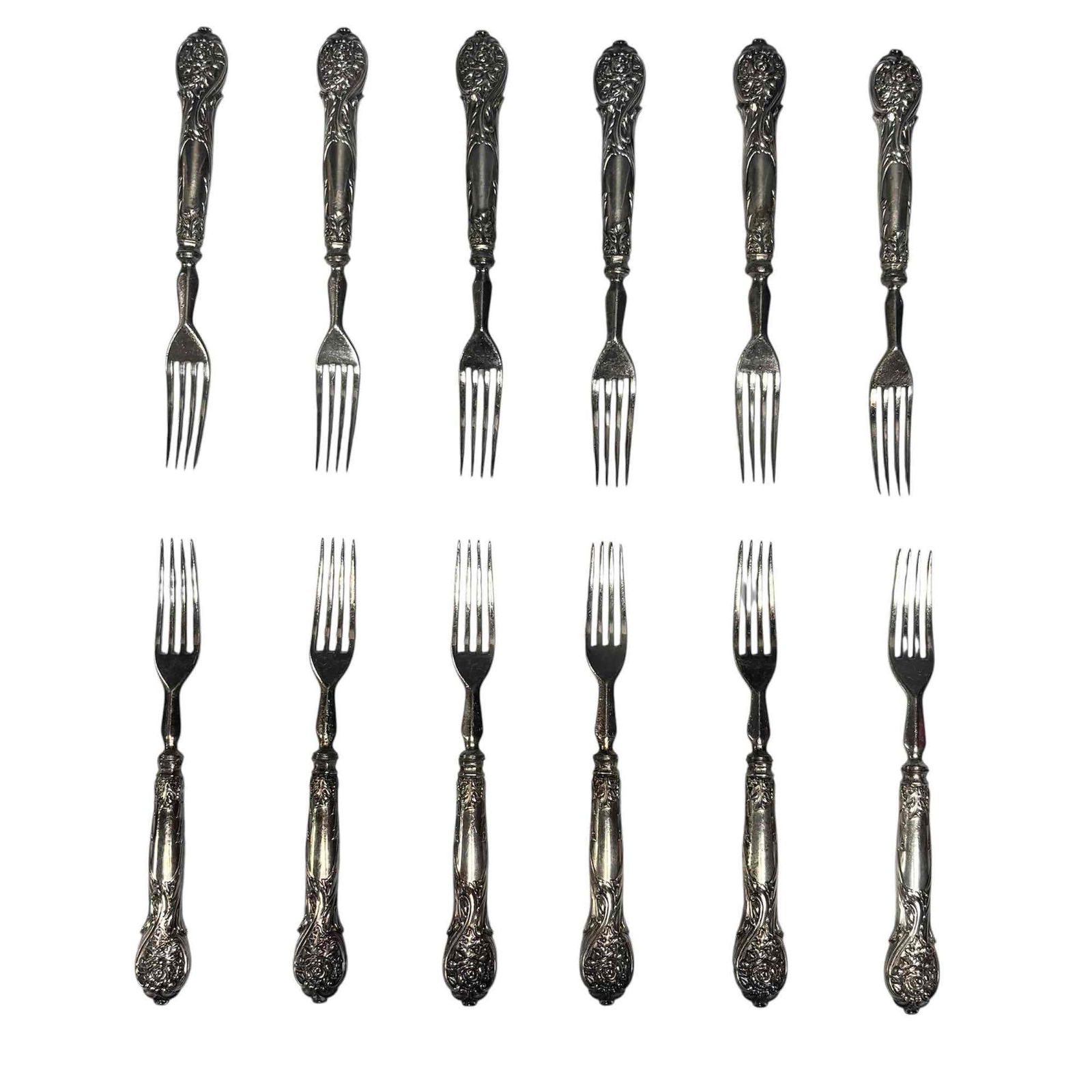 19th Century Art Nouveau Floral Strawberry Forks (12): Set of twelve late 19th century art nouveau salad or strawberry forks. Having ornate floral and foliage decor with narrow prongs. Measuring approx. 7.25" long. In good age appropriate condition, see p