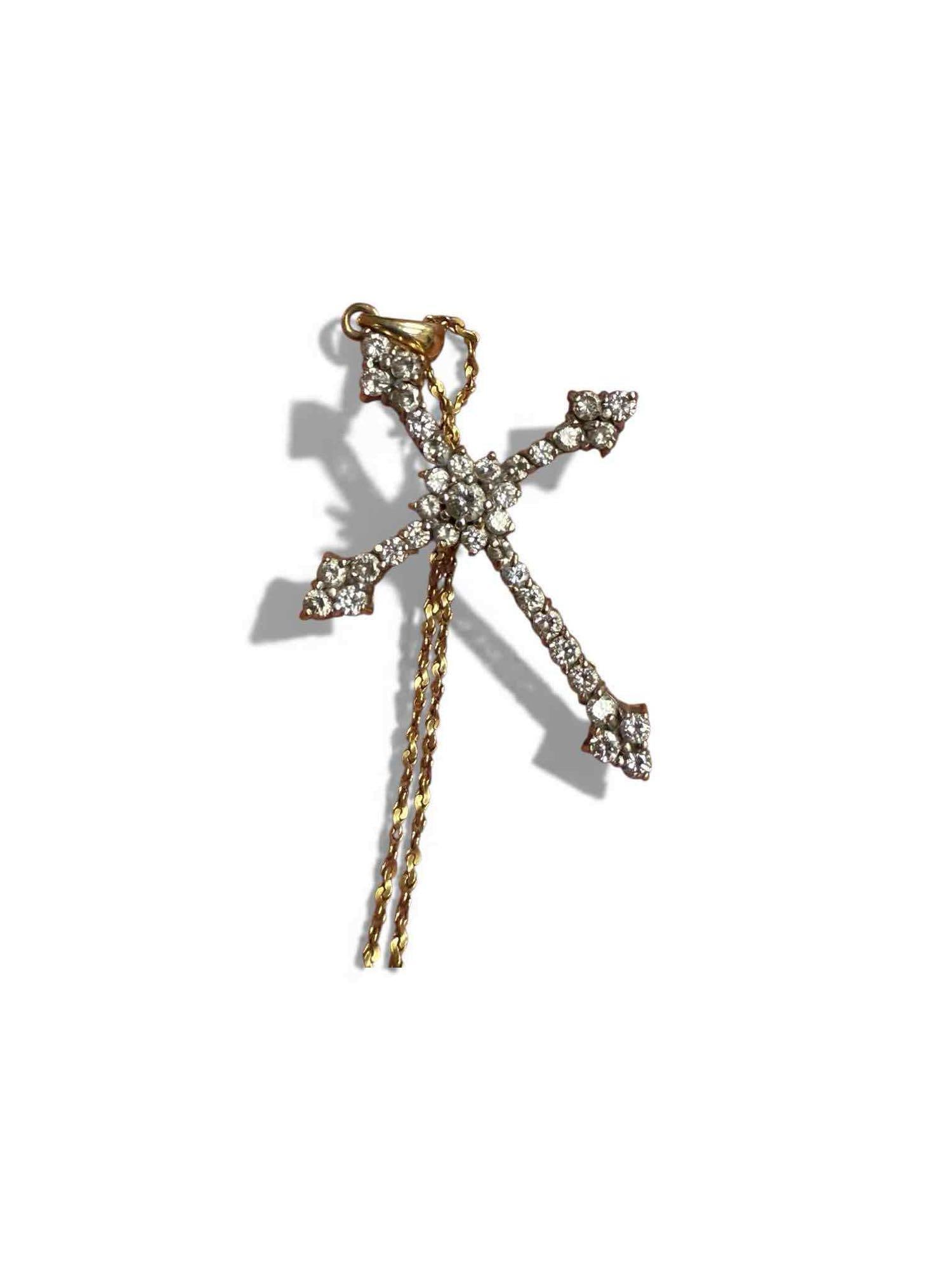 14K Yellow Gold & Diamond Cross and Chain: 14k yellow gold diamond cross on 14k yellow gold chain. Cross measuring 1.5" tall by 1.25" wide with chain measuring 20.75" long. Total weight of 8.2 grams. In good condition, see photos.