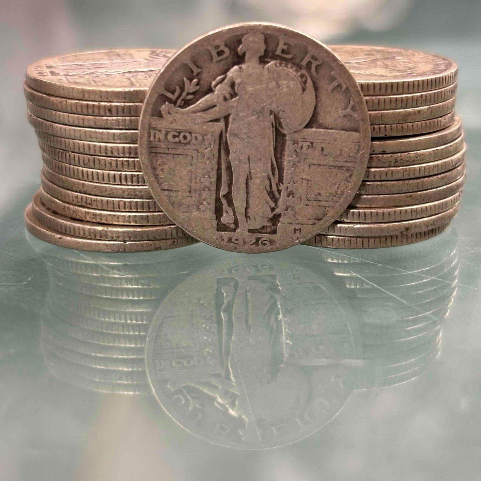 25 Standing Liberty Quarters 90% Silver: 25 Circulated Standing Liberty quarters 90% silver content. See photos.