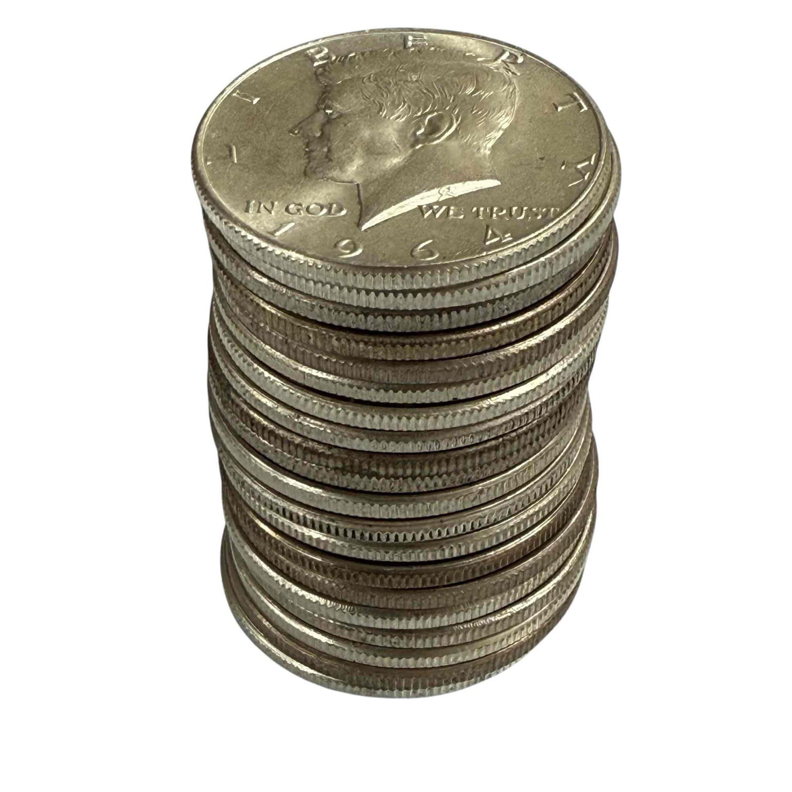 1964 Kennedy Silver Half Dollars (20) Appear Uncirculated: 20 1964 Kennedy silver half dollars. Most appear to be uncirculated with one being a 1965. See photos for condition.