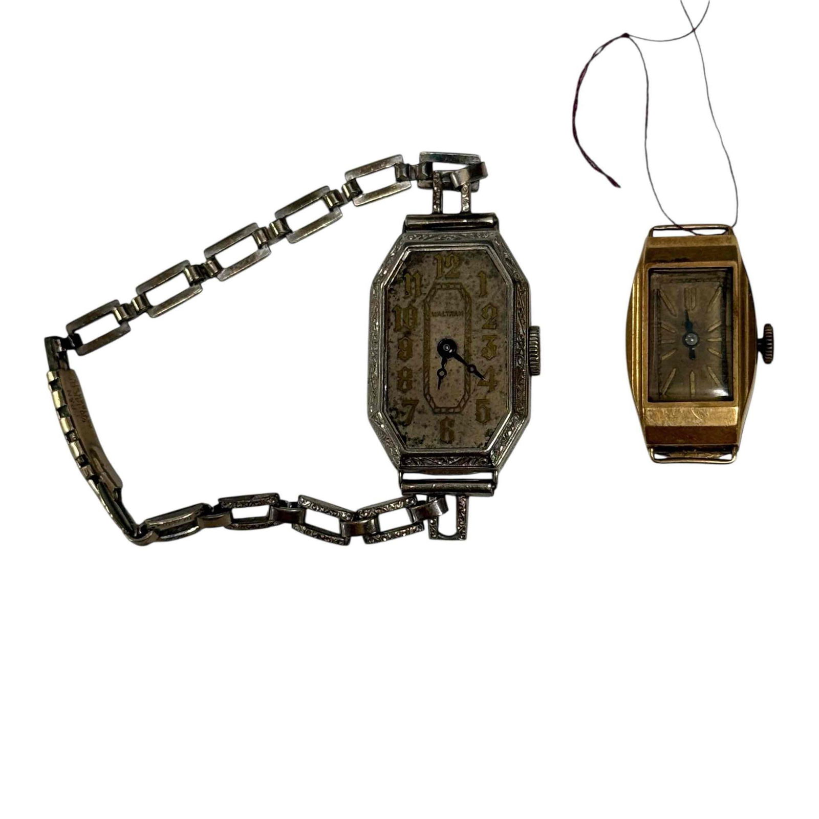 Doxa 18k Yellow Gold and Waltham 14k White Gold Watches (2): Early Doxa 18k yellow gold watch (no wrist band) with case weighting 3.7 grams, total weight 7.6 grams. Waltham 14k white gold watch with casing weighting 5.1 grams. Both in age appropriate untested c