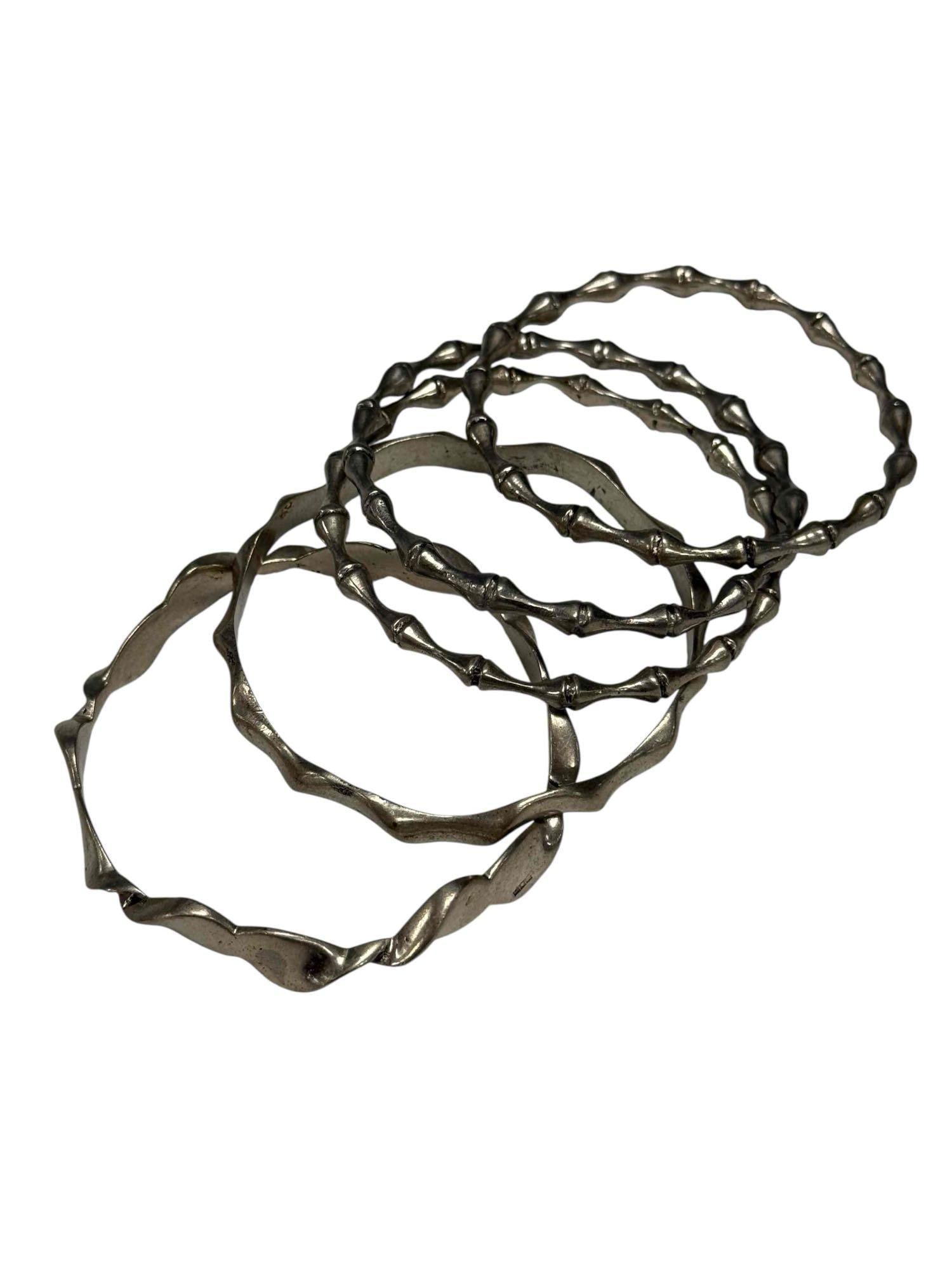 Five (5) African Taureg Notched Silver Cuffs: 2.25" diameter on all. Good condition as shown, see photos