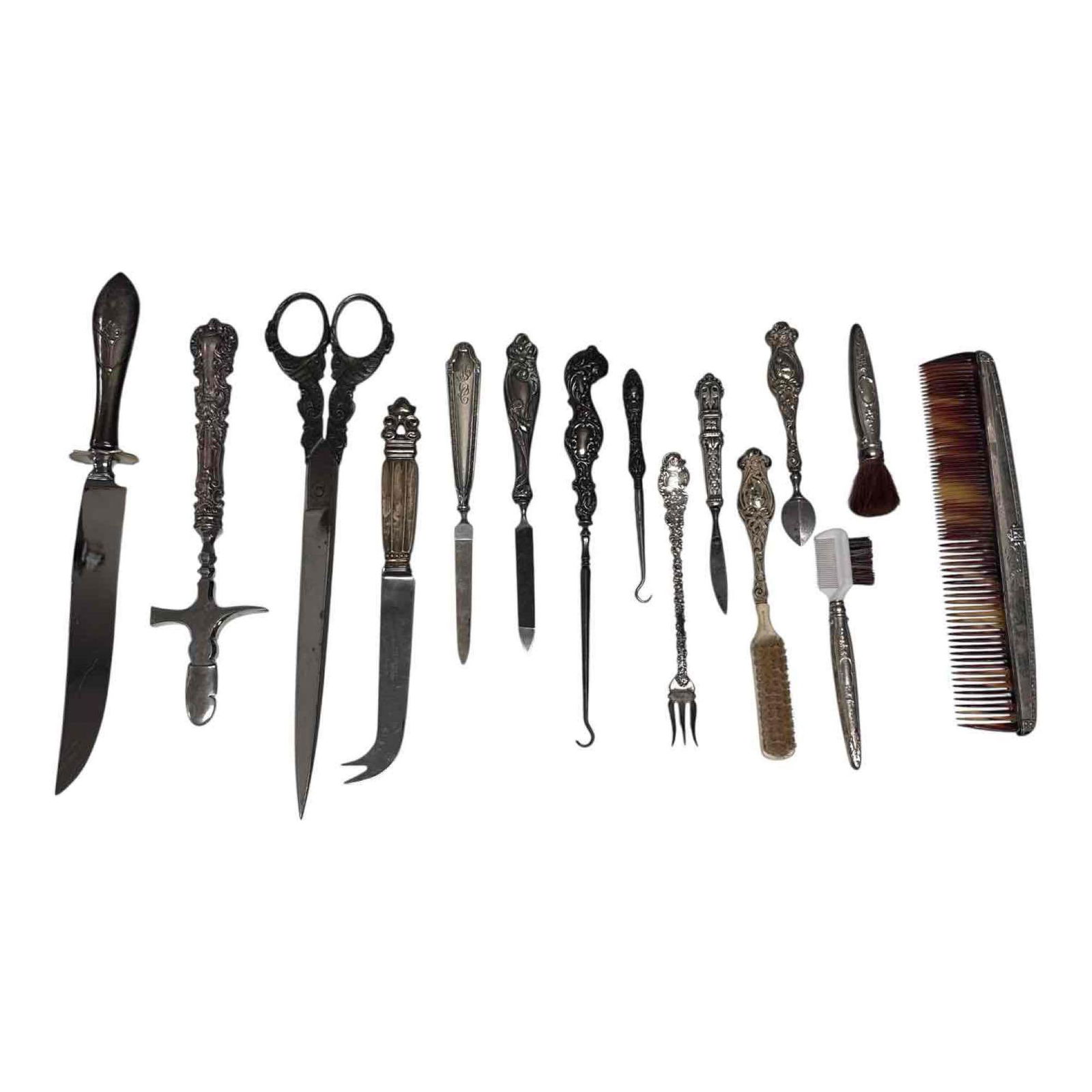 Sterling Silver Including Georg Jensen Utensils, Tools, Grooming, Job Lot (15): Group lot of various mostly sterling silver handles items including; Georg Jensen "Acorn" pattern cheese knife, comb, utility hammer tool, art nouveau nail files, eyebrow comb, all sterling pickle for