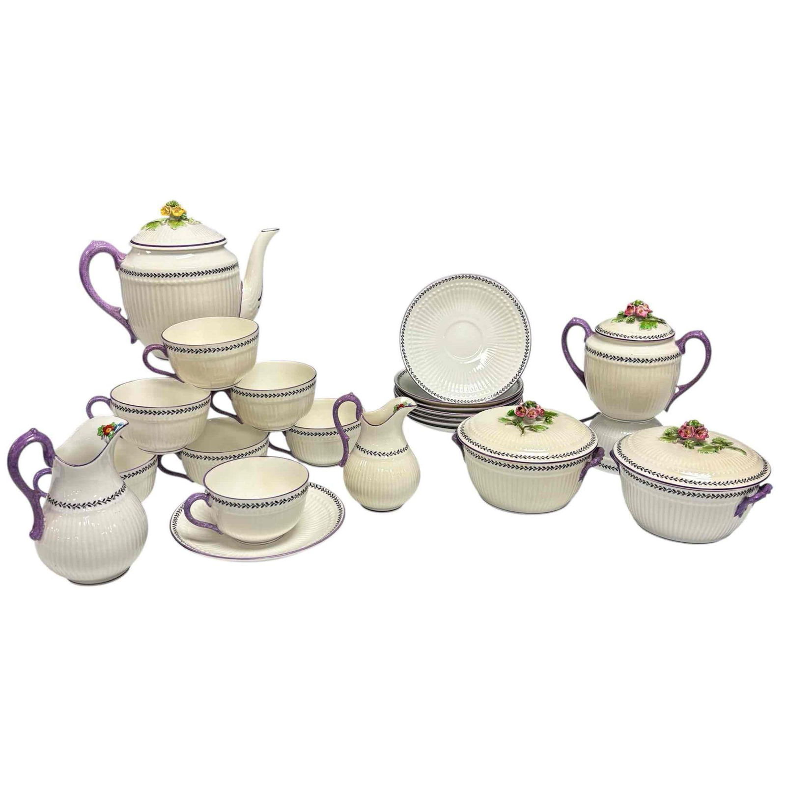 Staffordshire "Sweet Pea" Porcelain Tea Service for Eight: Staffordshire England "Sweet Pea" porcelain tea set service for eight. Fluted bodied porcelain with purple handles with full form floral lid finials. Set includes; teapot 6.25" tall, 8 teacups 2" tall