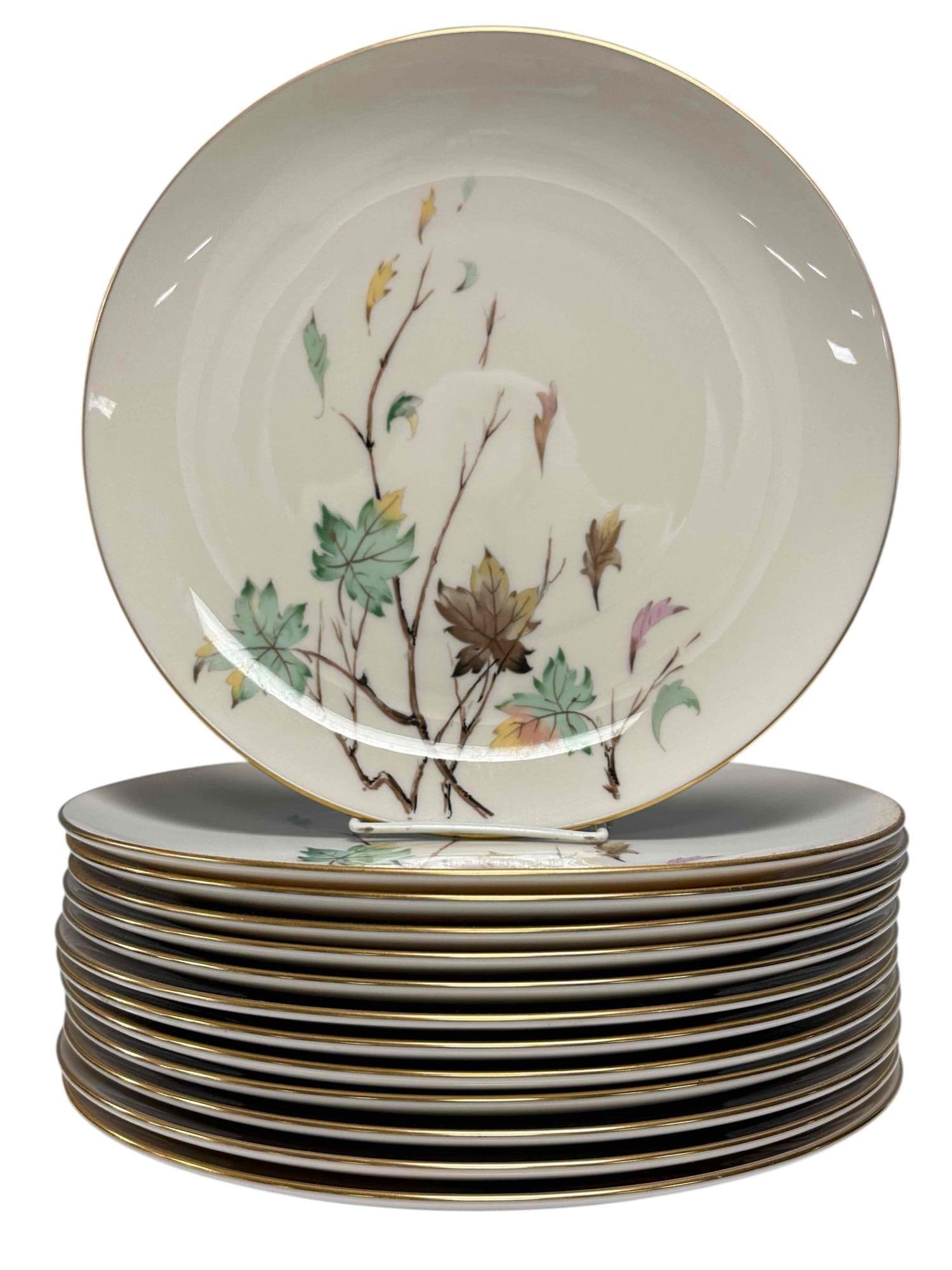 Lennox Westwind x407 Falling Leaves Dinner Plates: Lennox Westwind x407 falling leaves dinner plate set. Green, brown, yellow and mauve leaves on a cream colored background with gold-trimmed edges. Measure 10.5" set of 13 in overall good-excellent