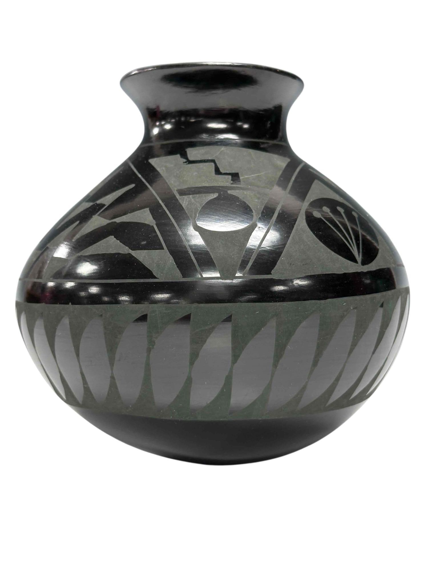 South Western Contemporary Mata Ortiz Pottery Vessel Signed: Black south western Mata Ortiz geometric art pottery vase. Having black gloss with dark grey matte finish and signed Martha Villa Pando on base. Measuring 6" tall. In good condition with no breaks or
