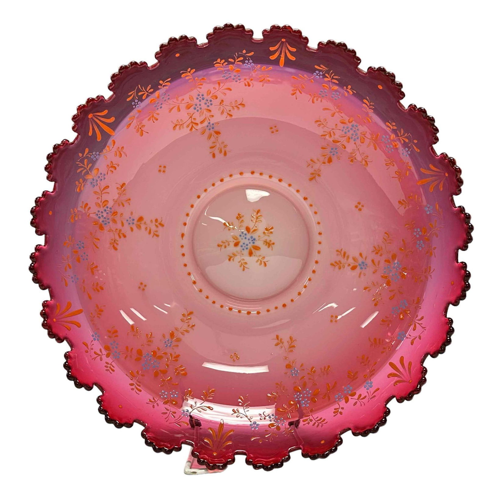 A Fine Cranberry Enameled Glass Art Deco Tray - attr. MOSER: A very fine and elegant art glass tray with wonderfully shaped top rim, interior enamel decorated and white opalescent exterior on footed circular base. Attributed to MOSER. Measuring approx 10 3/4" d