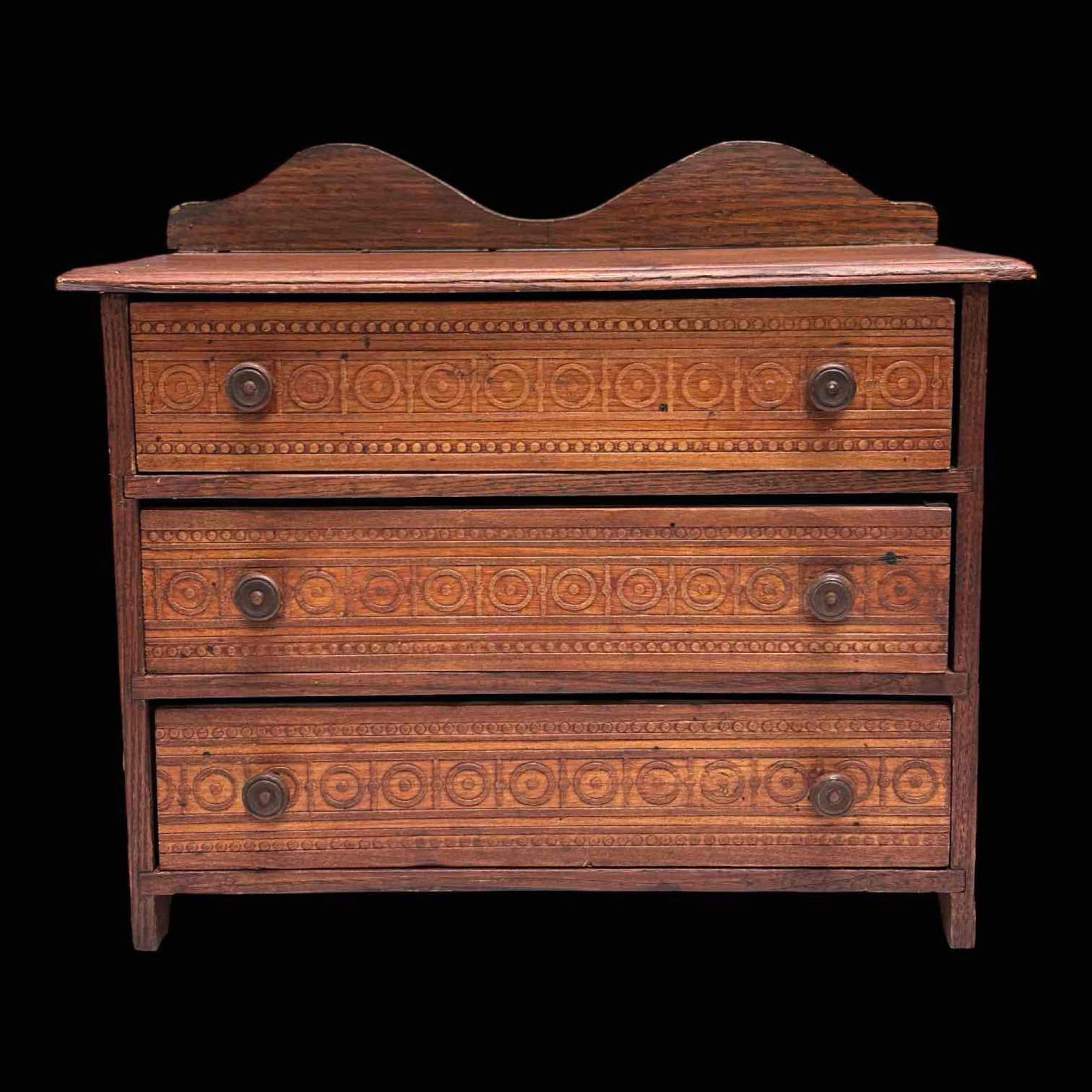 19th Century Salesman Sample Oak Three Drawer Dresser 11" Tall: Salesman's sample or children carved geometrical draw fronts three drawer dresser. Can also double as a dresser top jewelry chest. Measuring approx. 11" tall by 12.5" wide by 6.75" deep. In good age a