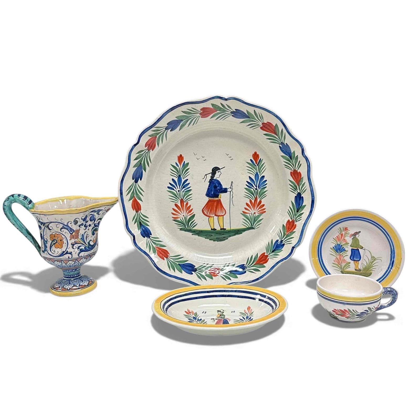 Collection of Hand-Painted Henriot Quimper Faience Pottery: Collection of miscellaneous Quimper pottery pieces. Large 15" serving platter. 8.5" Teapot. Coffee cup and saucer and gravy bowl. No cracks or repairs. See photos for condition.