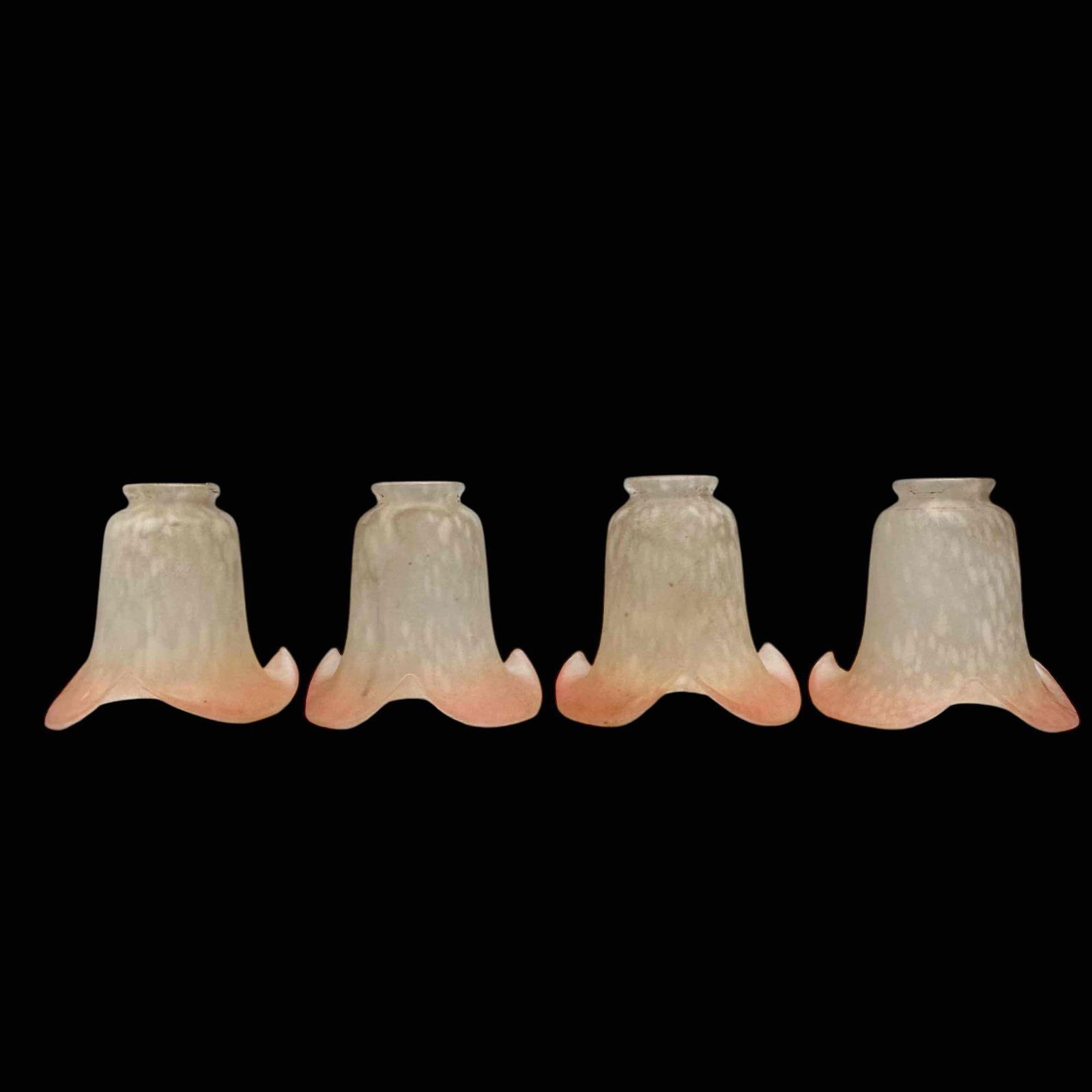 Speckled Pink Frosted Glass Lily Lamp Shades (4): Art nouveau white and pink frosted glass lily shades in a mottled speckled pattern and flared ruffle base. Measuring approx. 5.25" tall by 5.25" base and 2" fitting. In good age appropriate