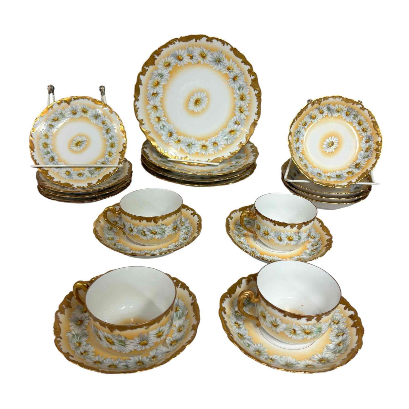 Tressemanes and Vgot Limoges Porcelain Luncheon Set for 4: Tressemans and Vgot Limoges luncheon or Tea set for four. Features hand-painted white daisies on yellow background with heavy gold accents. Set includes 4 8.5" lunch/salad plates, 4 6" app or bread pl