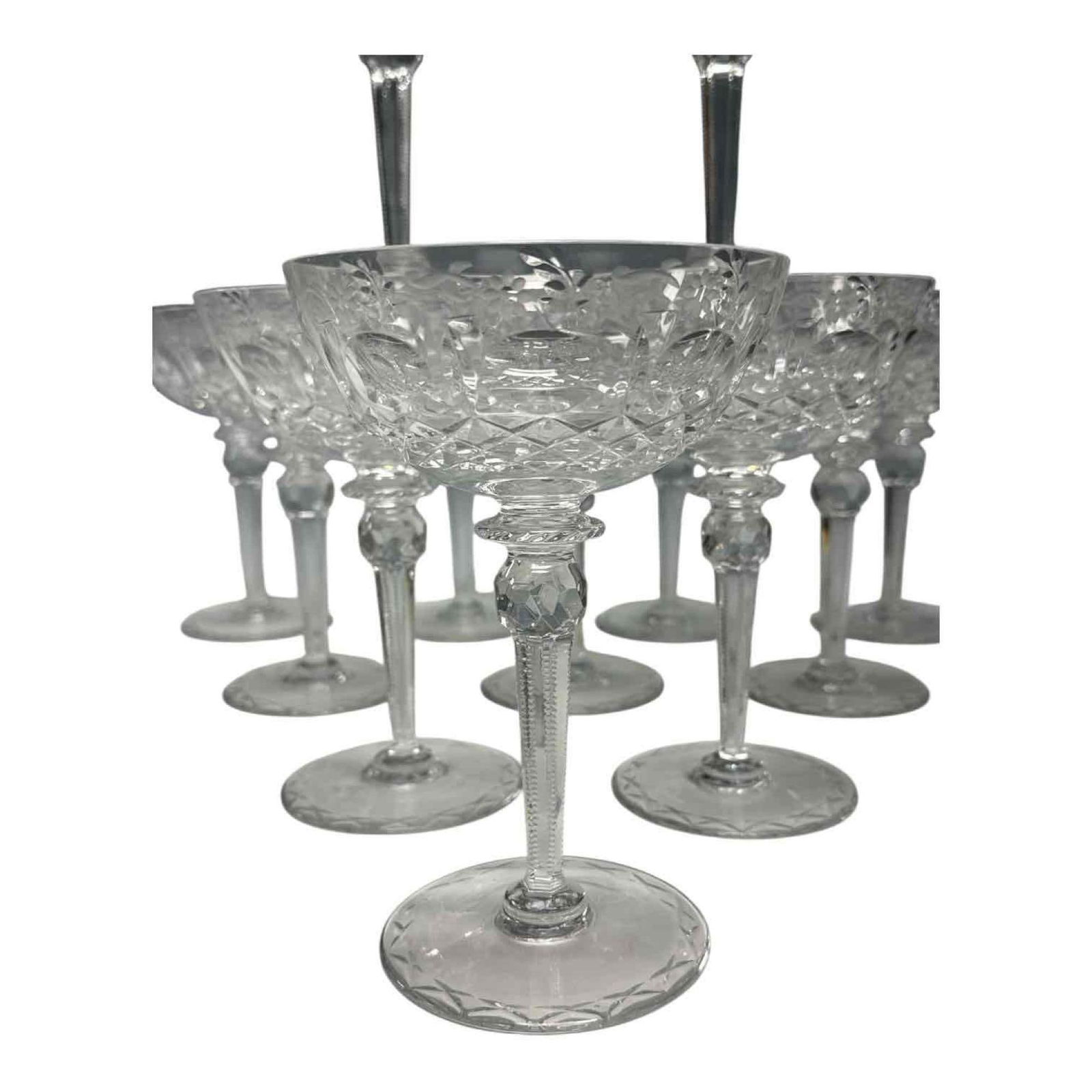 Gallia Etched Crystal Stemmed Martini or Sherbet Glasses 7" (12): Set of twelve Gallia clear cut and etched crystal tall martini or sherbet stemmed glasses. Featuring coin dot medallion mid body with etched floral accents and six sided notched stem. Measuring approx