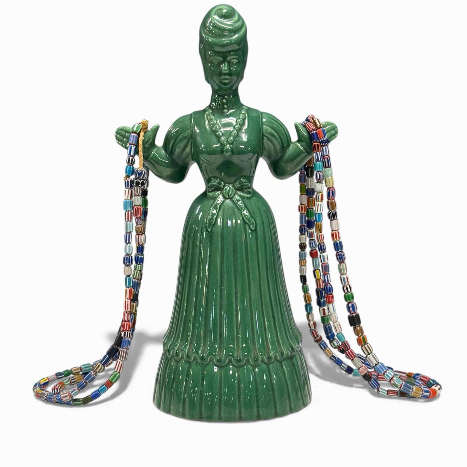 Chevron Beaded Necklaces on Ceramic Figural Necklace Tree (5): Four Venetian chevron glass bead necklaces on ceramic figural woman serving as a necklace display stand. Necklaces measuring approx. 24" to 25" long. In good condition, see photos.