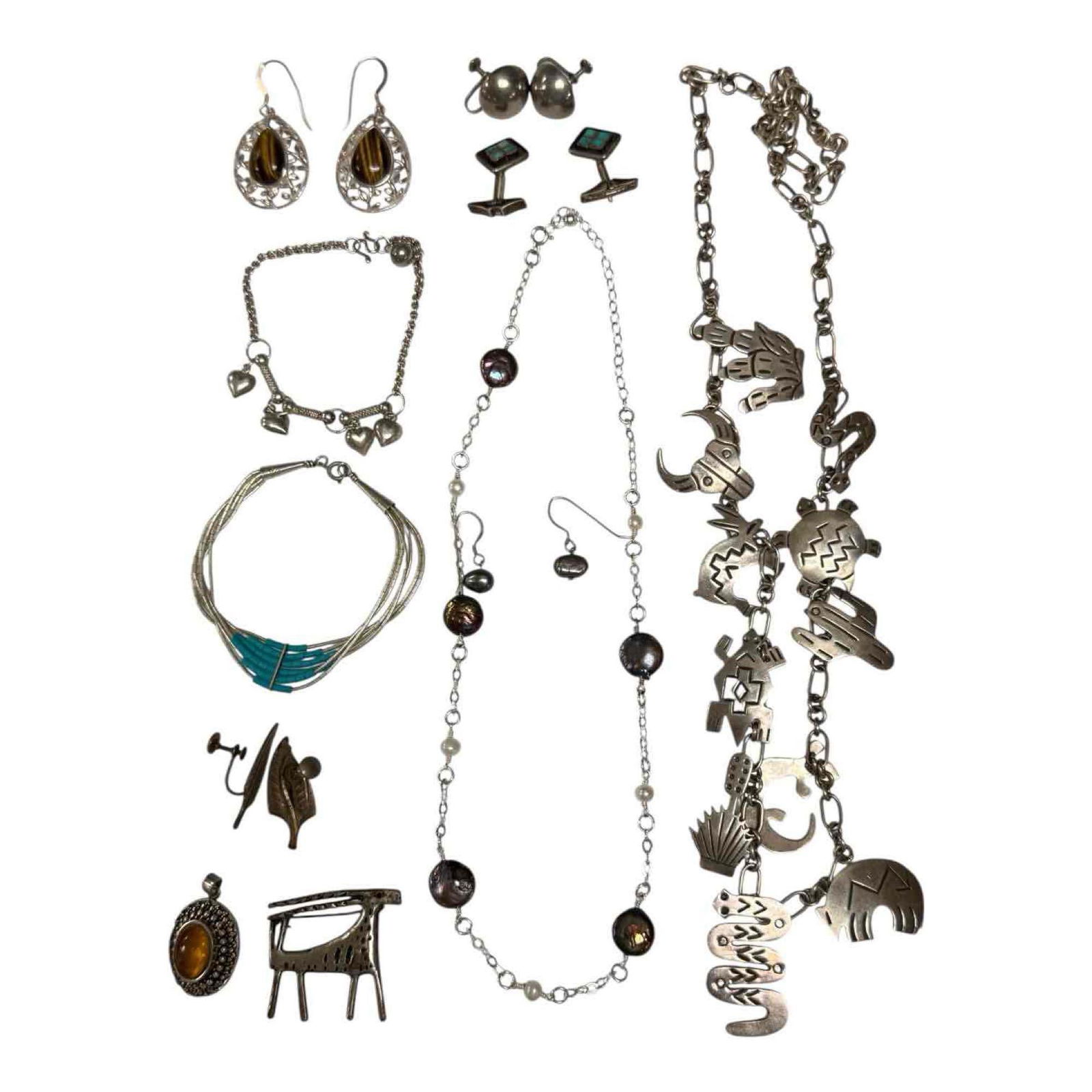 Southwestern Style Sterling Silver Jewelry Collection: Southwestern charm necklace with cacti, lizards, snakes, turtles and animals 28" long, turquoise cuff links, heart charm bracelet, earrings and more. Total weight of 139 grams. In good condition, see