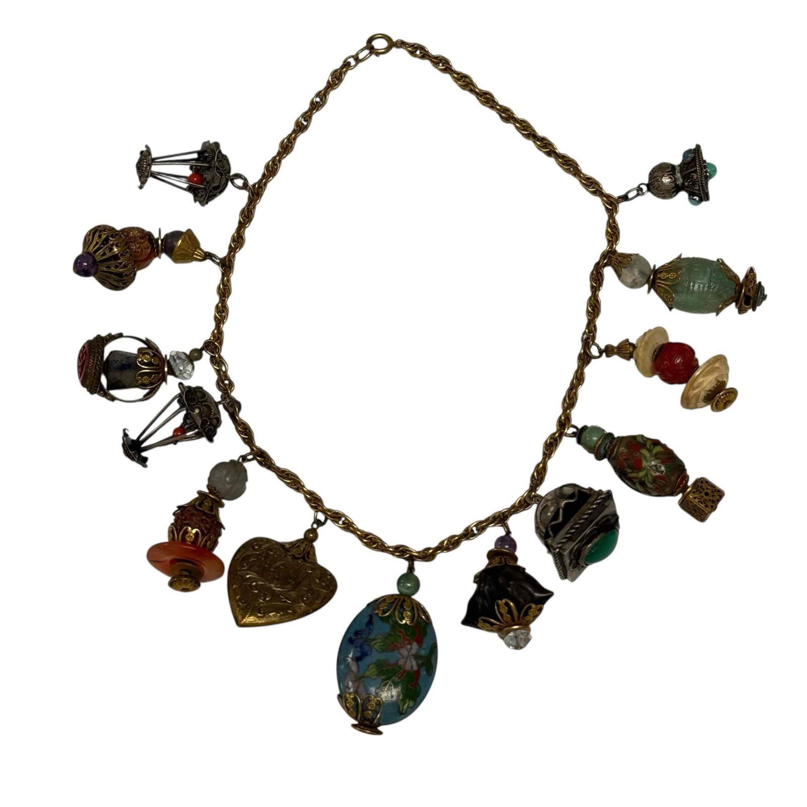 Asian Influenced Ornate Cloisonne Charm Necklace: Likely Miriam Haskell vintage Asian style charm necklace with cloisonne, stones, rings, lanterns, silver, filigree and other charms. Measuring approx. 17" long. In good age appropriate condition, see