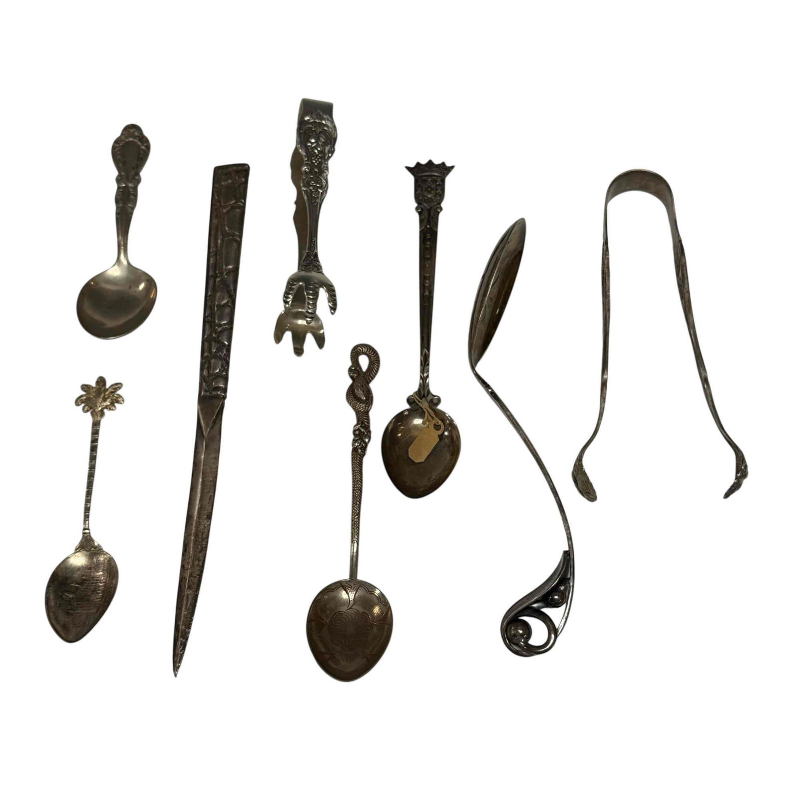 830-925 Silver Flatware and Utensil Group (8): Nagasaki 84 silver serpent spoon 5" long, Red & Barton Francis sterling silver sugar tongs 4.25" long, sterling baby teaspoon 4" long, W & SS art nouveau 830 silver pieced spoon 6.25" long, st