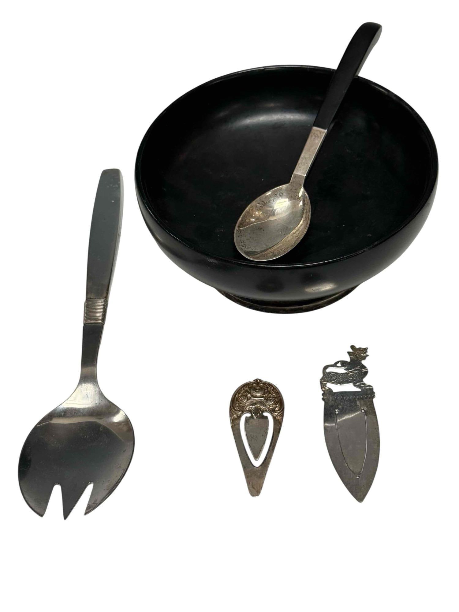 Miscellaneous Sterling Lot: Miscellaneous sterling lot. Contains a bowl with a sterling ring around the case, which measures 3.75" round bowl measures 6" round. 2 Sterling bookmarks that weigh 14g. A sterling handle Denmark spoo