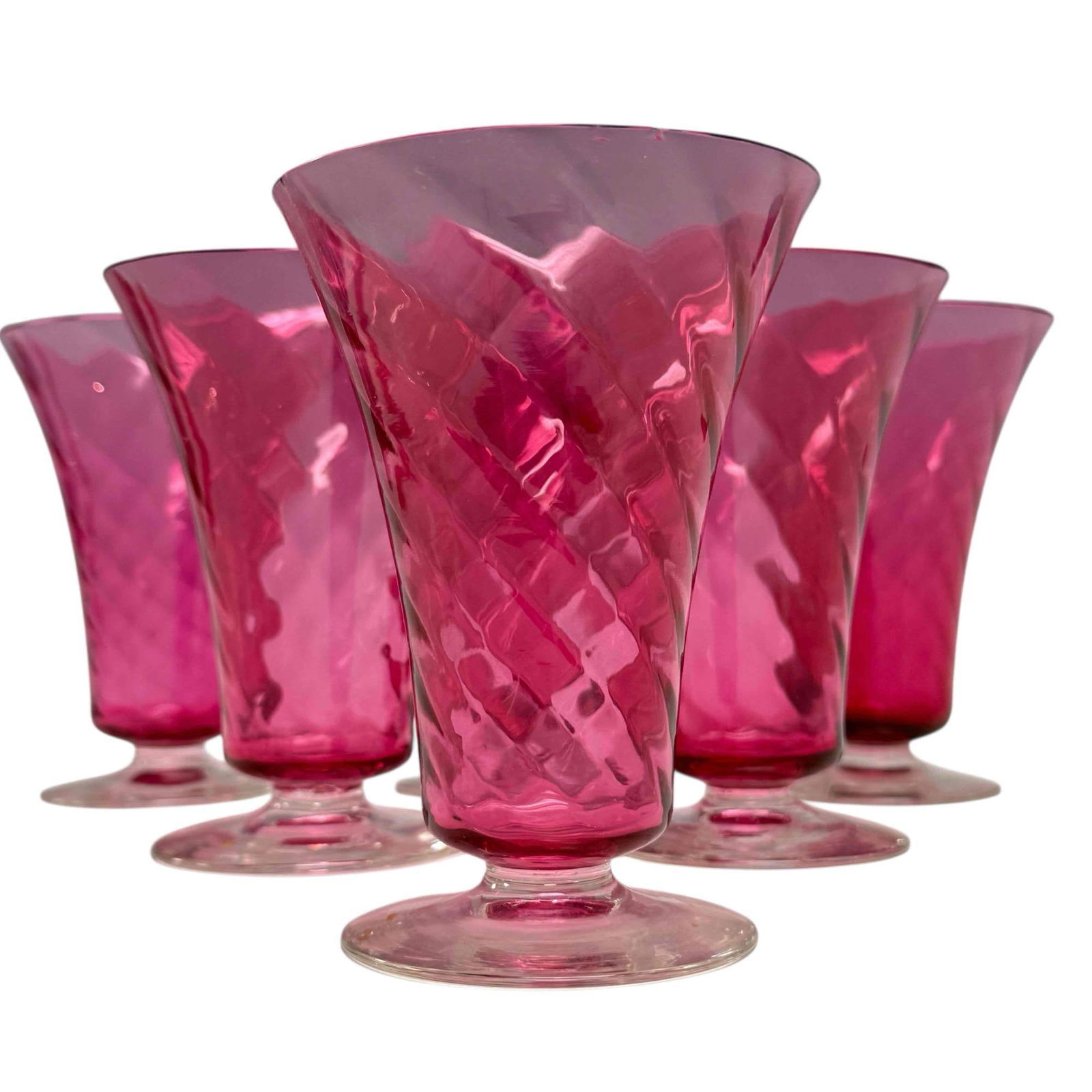 Swirl Cranberry Glass: Set of six Cranberry swirled glasses. All in good condition with one having some minor rim chips. See photos. Measure approx 5" tall by 3.5" wide.