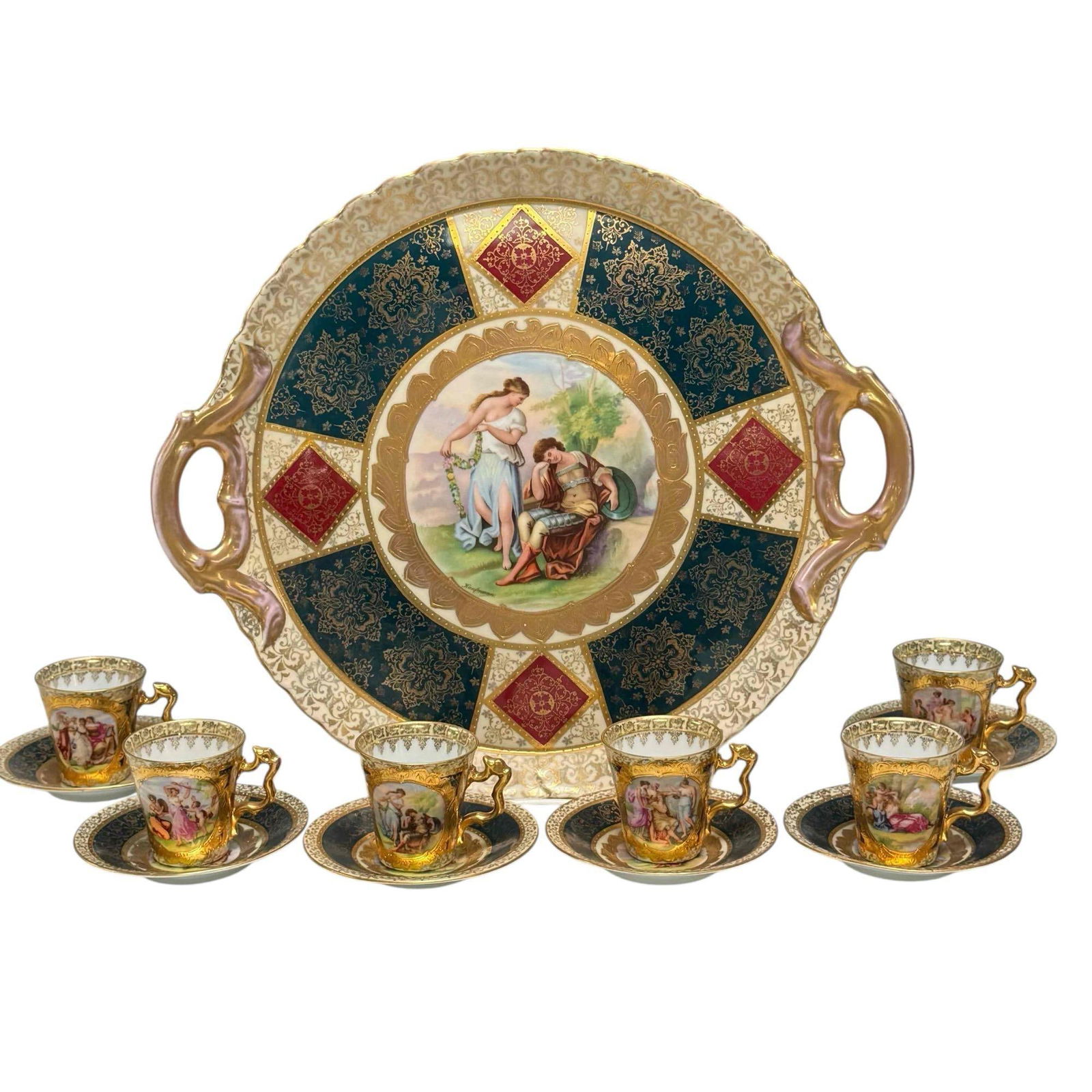 Royal Vienna Neoclassical Demitasse Tea Set.: Royal Vienna neoclassical demitasse tea set. Set includes a large ornate tray with gold gilding and a neoclassical center scene. Some gilt loss on the handles. Set includes 6 cups and saucers. Overall