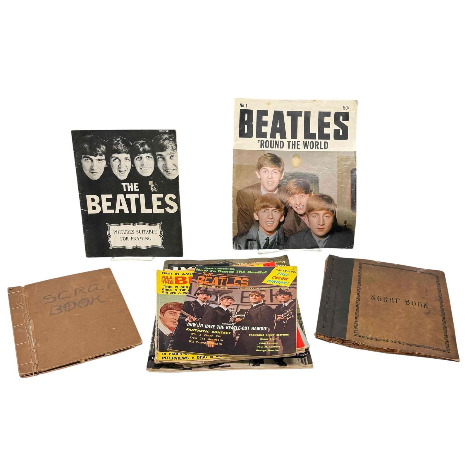 Beatles Vintage Magazines and Scrap Books: Group of vintage Beatles magazines and two early scrap books with old cards and cut outs. In age appropriate condition with signs of age and wear, see photos.