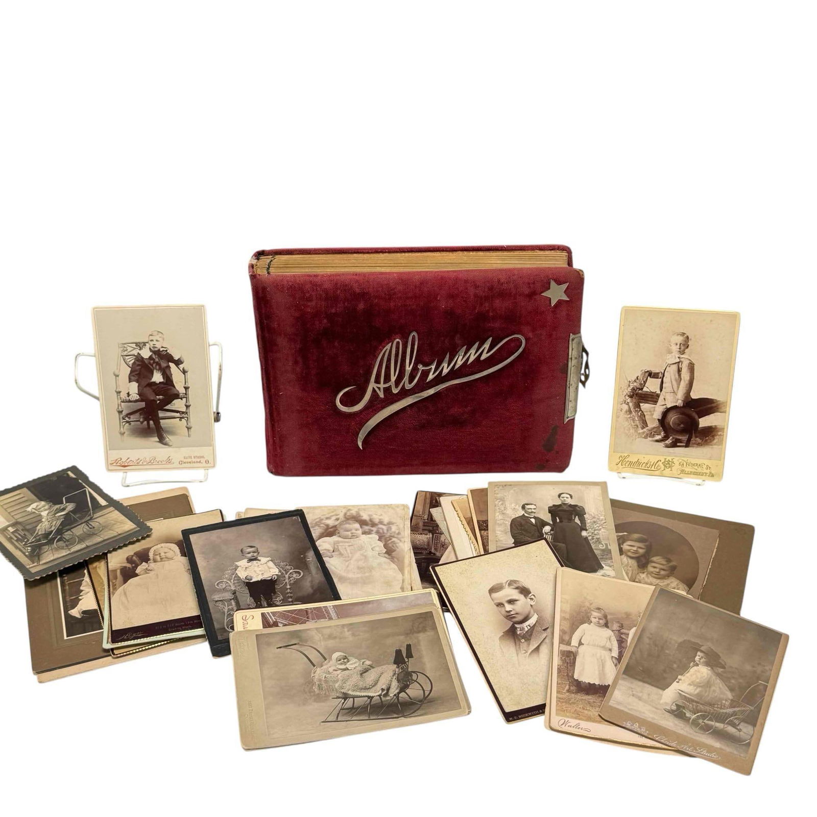 Filled Victorian Velvet Photo Album and Additional Photo Cards: 18 double page photo album with photos and additional black and white photos cards. All in good condition, no issues, as shown, see photos. Measuring approx 12" w x 9" x 3" t.