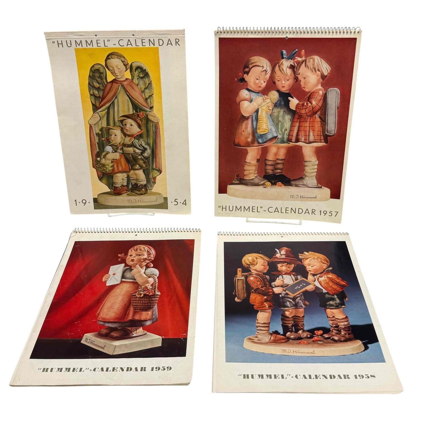 Four 1950's Hummel-Calendars.: 4 Hummel Calendars. 1954, 1957, 1958, and 1961. Featuring different Hummel every month. Overall, good age-appropriate condition. No seen markings in the calendars or dates, but two of them do have som