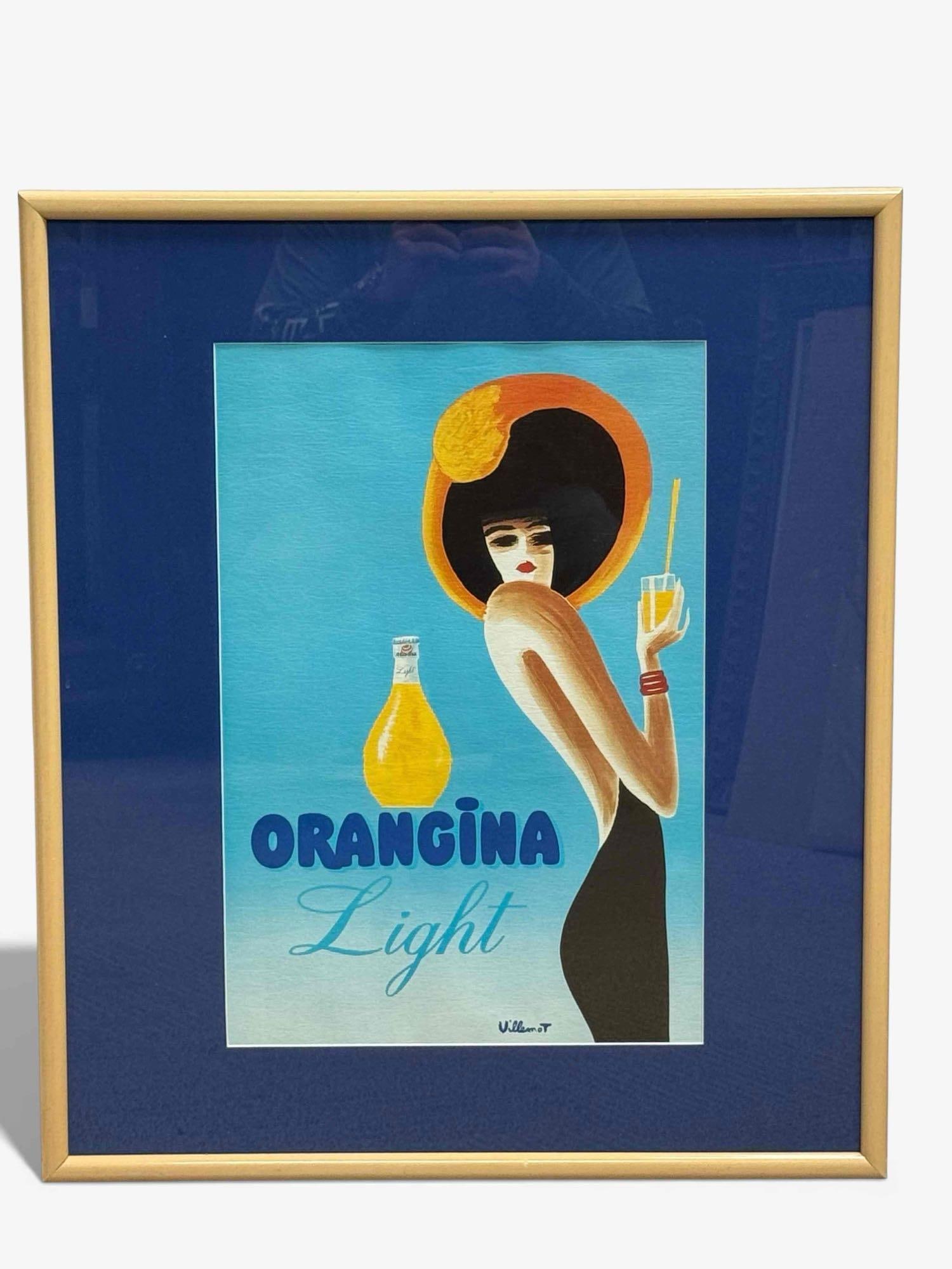 Framed Orangina Light Villemot Advertising Piece: Orangina Light Villemot framed advertising piece. Print on textured linen or paper, giving the appearance of ocean water blue fading to white sandy beach. Advertising poster with a matte blue border i