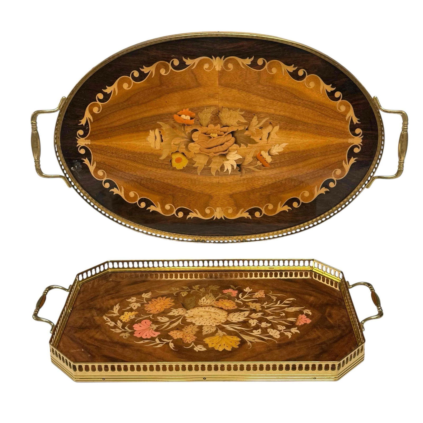 Italian Marquetry Floral Inlaid Butlers Trays (2): Two mid century Italian marquetry wood inlay butler serving trays with floral decor. Oval tray measuring 21" handle to handle 12.25" wide square body measuring 16.5" handle to handle by 9" wide. Both