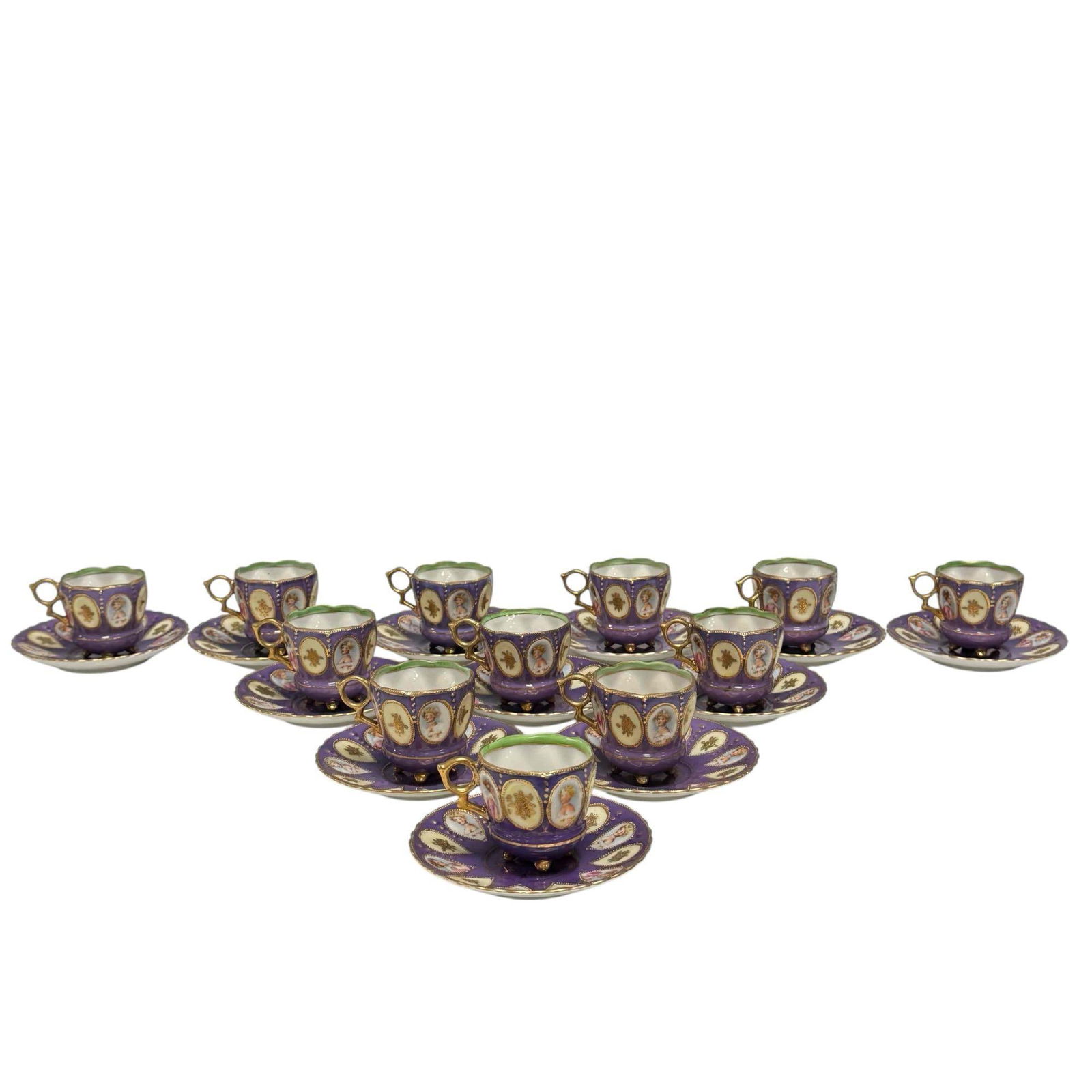 Saji Demitasse 12 Tea Cups and Saucers: Saji Occupied Japan small teacup and saucer set of 12. Purple color with trim and hand-painted miniature portraits. Footed cups with gold handles. Saucers measure approx 4.25" cups stand approx 2" tal