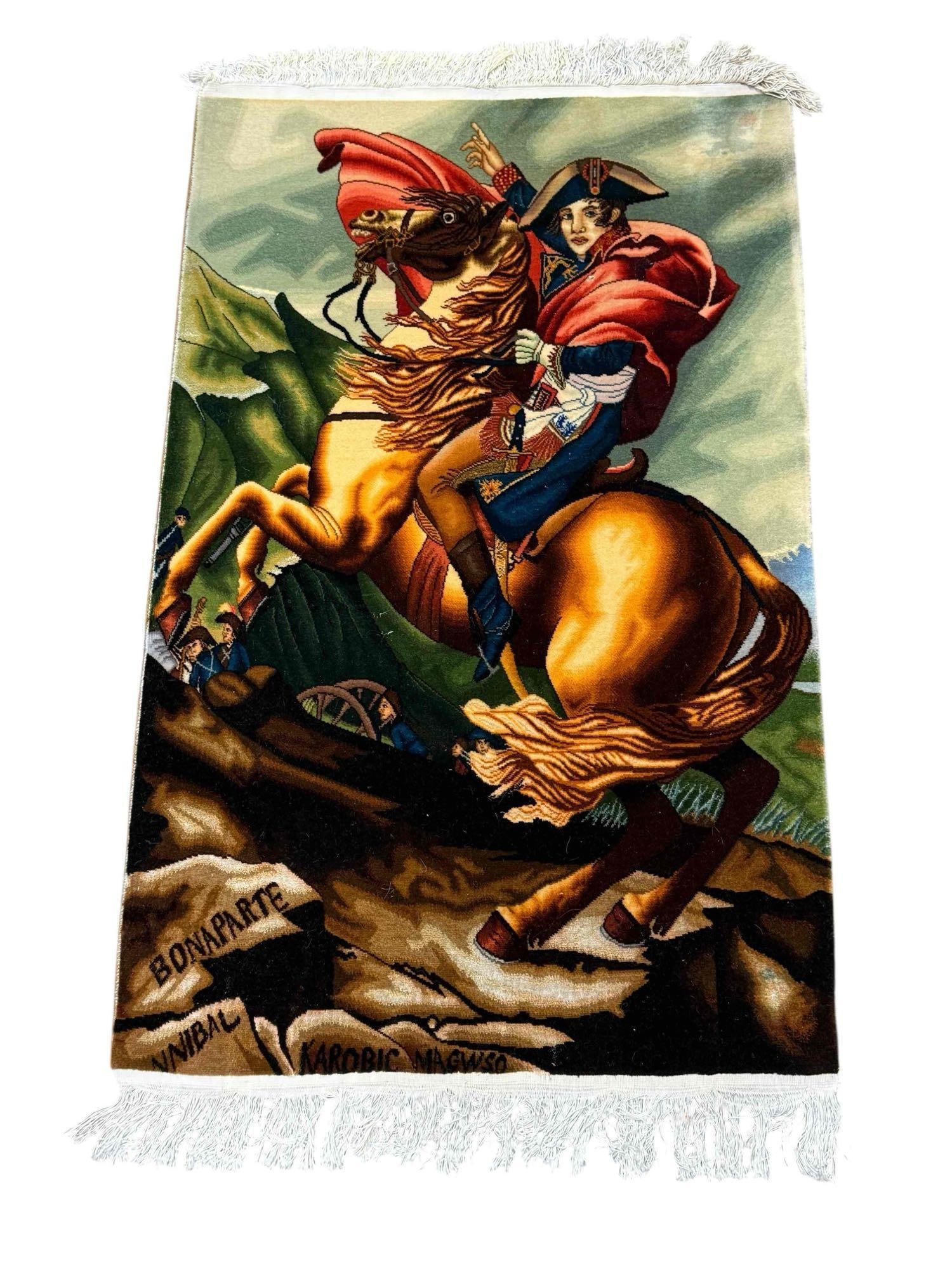 Napoleon Bonaparte Woven Throw Rug / French Carpet: Fringed rug, depicting Napoleon Bonaparte seated on horse and soldiers. Measuring approx 57" l x 31" w x 1" thick. Good condition, as shown see photos
