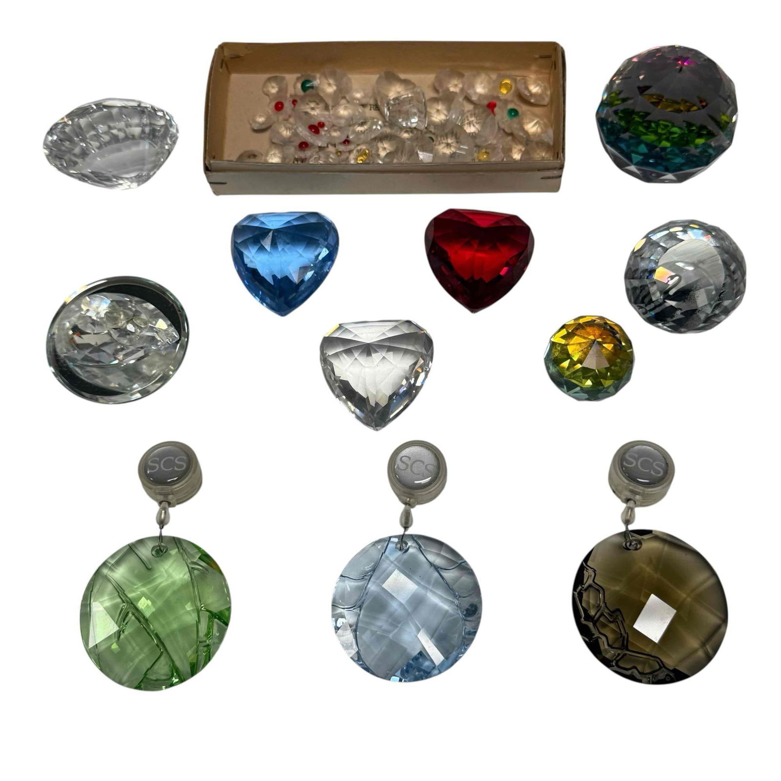 Crystal Hearts Paperweights and Suncatchers by Swarovski: Most society collectors pcs. Includes; three bamboo suncatchers 2" long, heart trilogy 1.75",vitrail paperweights 1" to 2" tall and miscellaneous hearts and flower pieces. In good condition, see photo