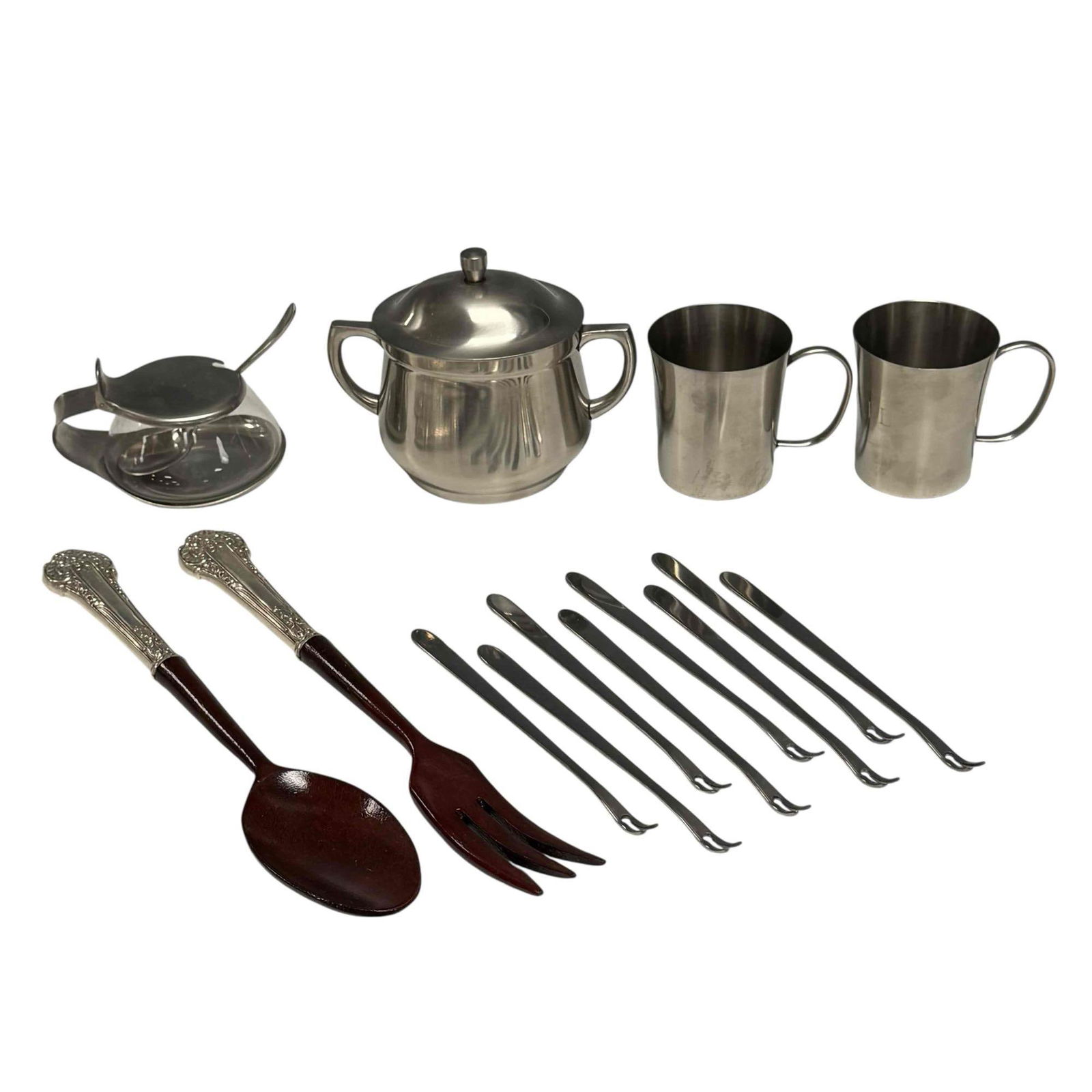 MCM Cromargan Germany Stainless Steel Pieces and Sterling: Includes; pair of teak and sterling silver salad set approx 11", eight olive / hors d'oeuvres forks and great mid century glass vessel sugar jar, two stainless cups and one stainless hinged double han