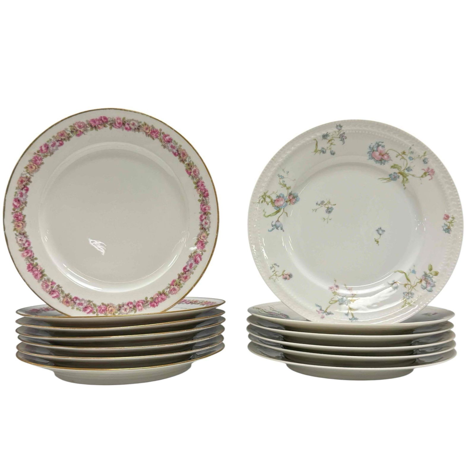 Haviland and Co. Limoges Dinner Plates (13): Set of six Limoges Haviland & Co. France "Schleiger" blue and pink flower pattern 9.75" diameter accompanied with seven Charles Field Haviland Limoges GDA pink rose halo dinner plates with gold