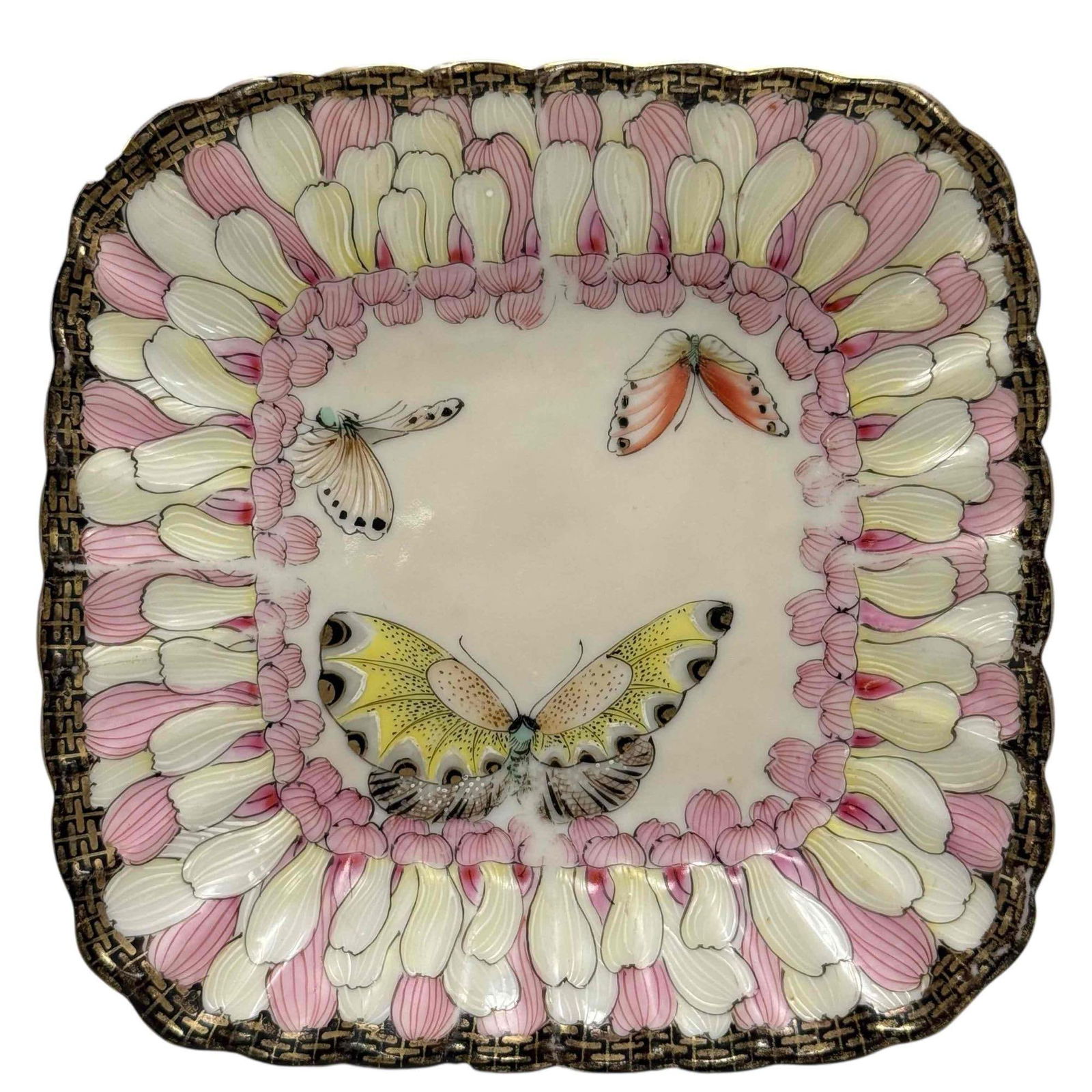 Japanese Fujimoto Moth and Mushroom Dish: Japanese hand painted dish depicting three moths bordered by pink and yellow mushrooms with scalloped gold and black rim. Moth, in Japanese culture are viewed as both eerie messengers from the dead