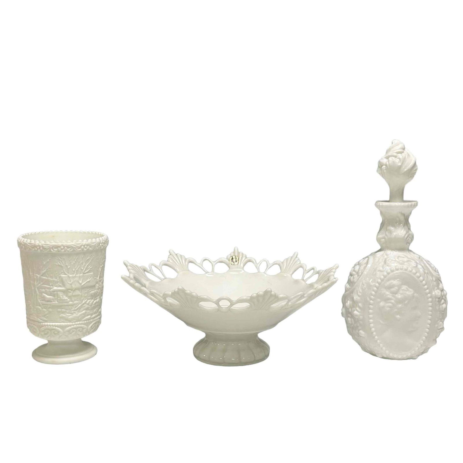 Westmoreland and Fenton White Milk Glass Group: Includes and reticulated Westmoreland pedestal center bowl with original label measuring approx 11" diameter x 5" tall, a cameo portrait decanter bottle with stopper approx 11" tall and a FENTON count
