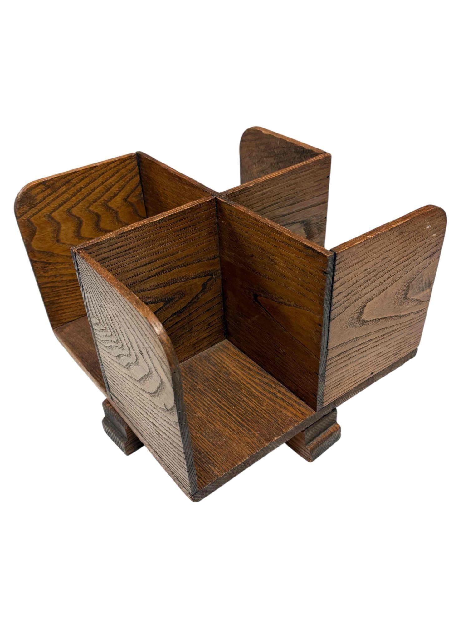 Oak Danner Style Revolving Table Top Book Case / Stand: Oak divided book holder on rotating stand. Measuring approx 9.5" h x 12.5" x 12.5". Light use and wear, early 20th century arts and crafts book holder, see photos