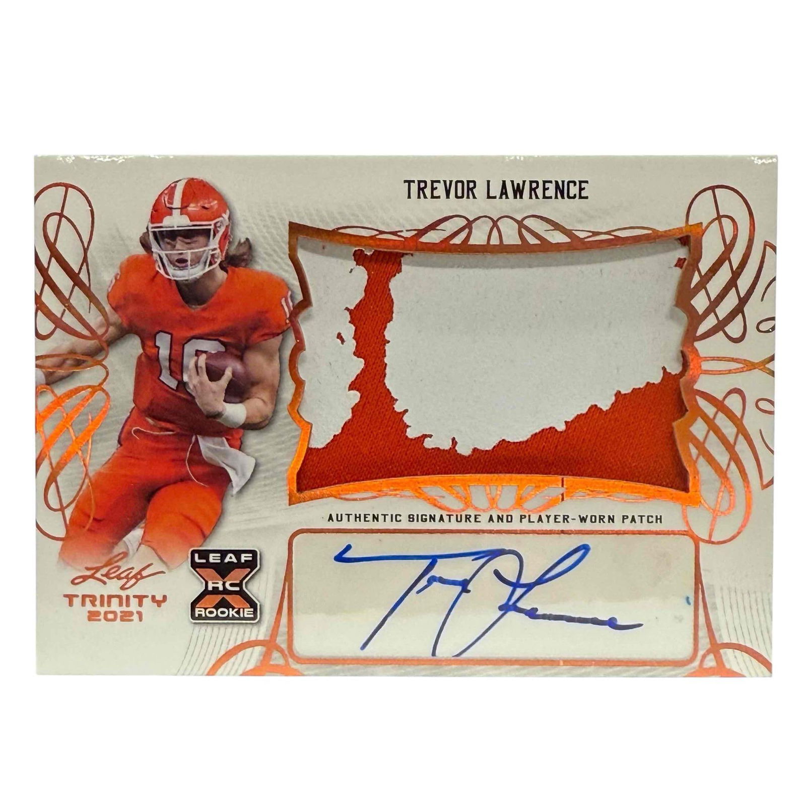2021 Leaf Trinity XRC RC Auto/Patch Trevor Lawrence Rookie Card WOW: Stunning card that features a very large patch from the Tiger mascot paw logo on the shoulder of the jersey. Blue signature displays nice. Very think card in part due to the large jersey swatch/patch.