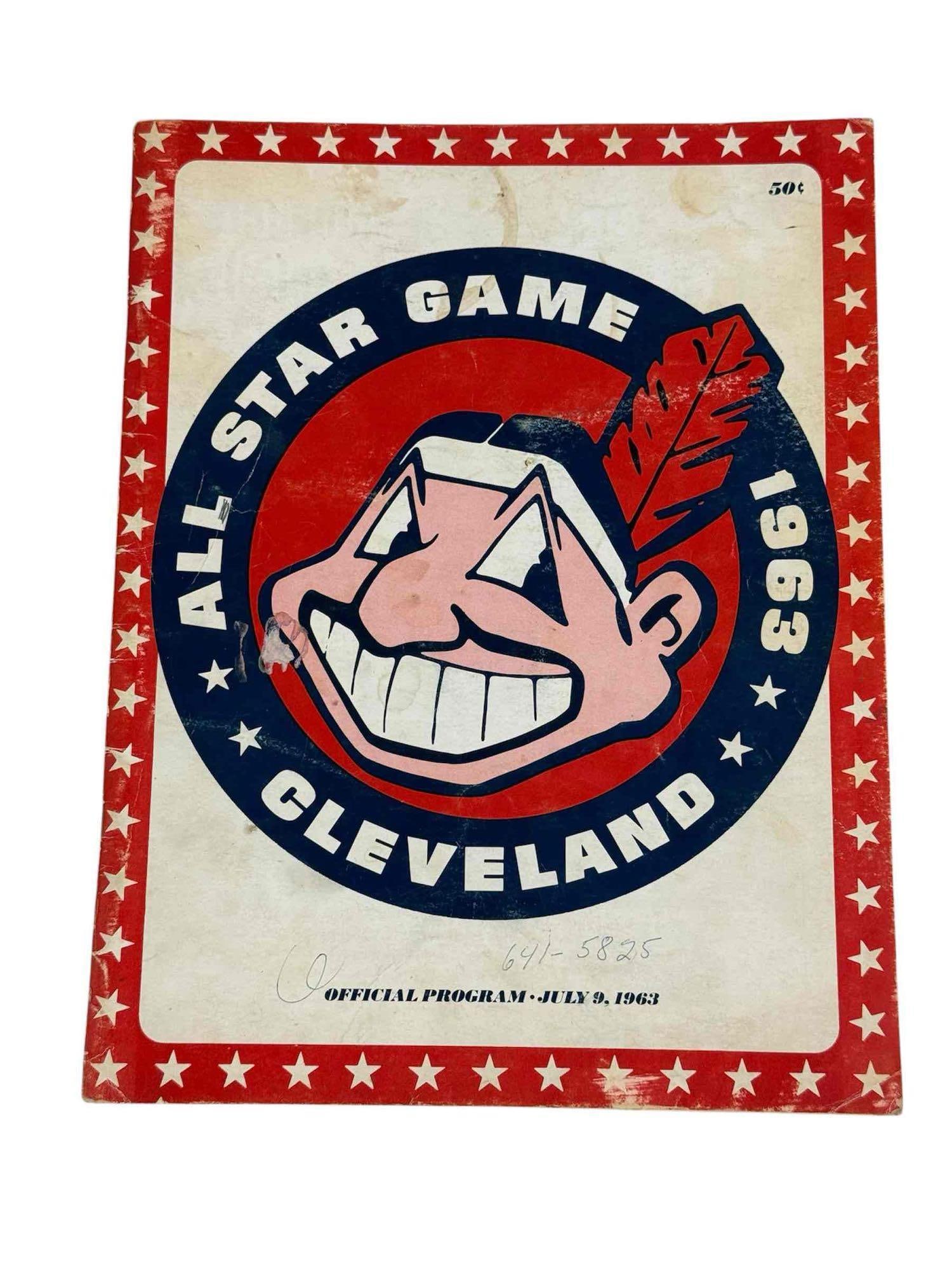 1963 All-Star Game Program Cleveland Indians: Program from the mid-summer classic that was played in Cleveland with a large Chief Wahoo on the cover!. Writing on the cover and score card page. Wear and age on cover.