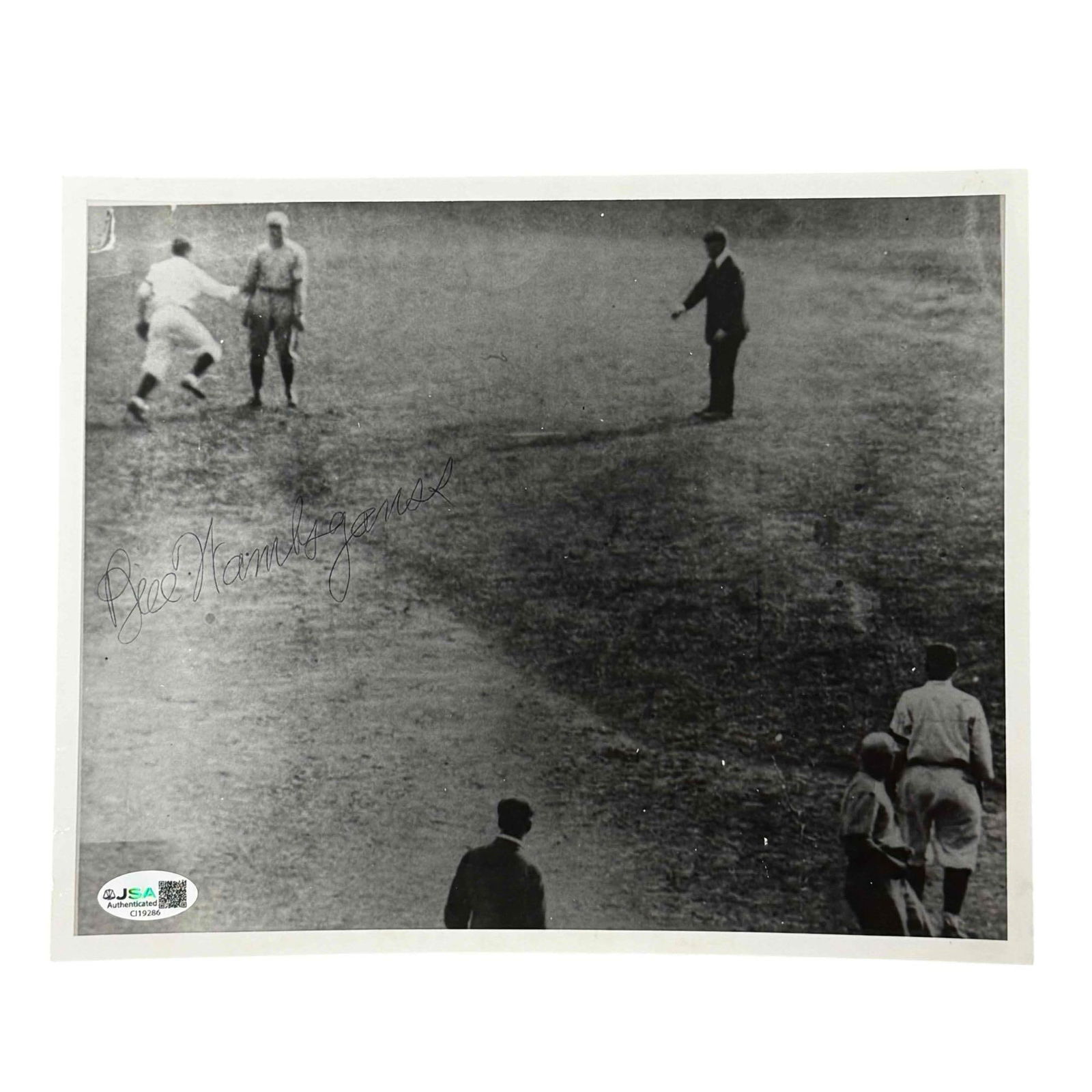 Bill Wambsganss Autographed Photo Cleveland Indians JSA: Black and white 8x10 photo that is a blown up image of Wamby tagging out a guy. Might be his famed triple play in the World Series? Ballpoint pen signature. JSA certified.