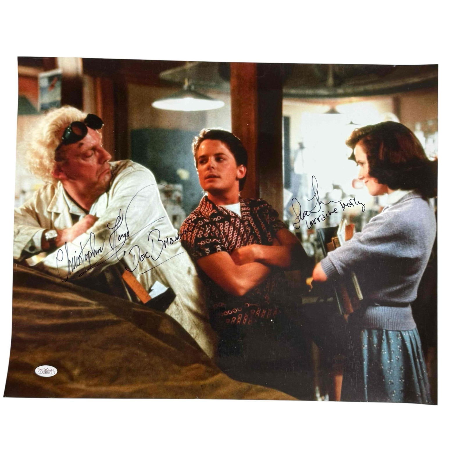 Christopher Lloyd and Lea Thompson Signed Back to the Future 16x20 Photo: Color photo signed in black marker by each star along with their character names. Great piece ready to be framed up! JSA certified.