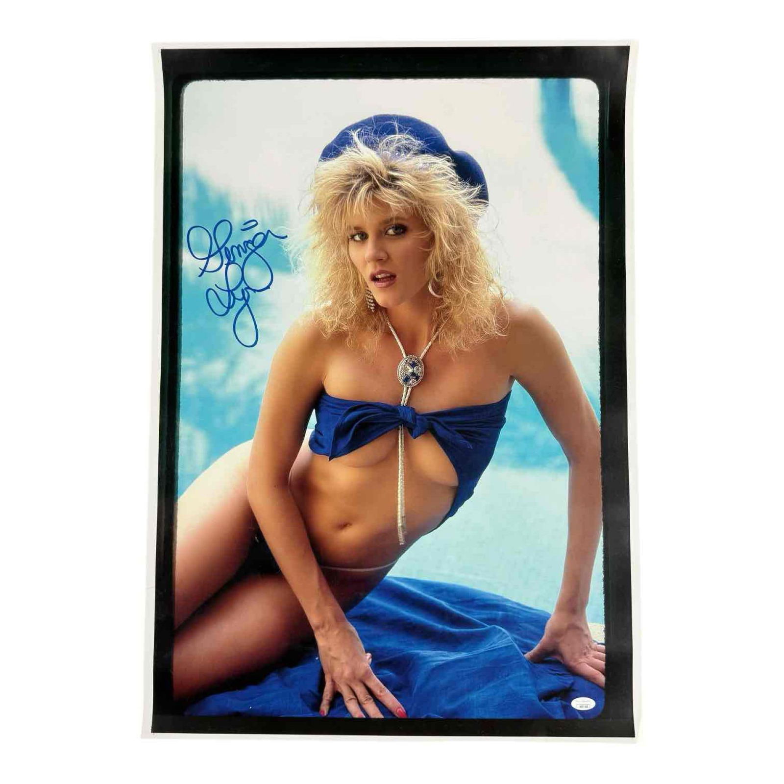 Ginger Lynn Autographed Poster JSA: Approx 29x21 color photo of the actress and adult entertainment star. Very large blue marker signature. Amazing piece to frame and display. JSA certified.